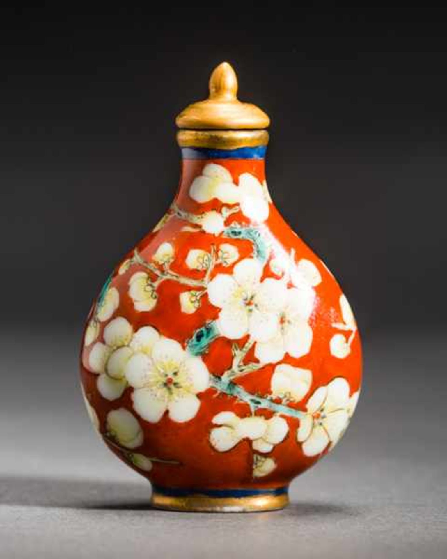 BLOSSOMING PLUM TREE Porcelain with enamel paint. Stopper: gilded porcelain, ivory spoon. China,