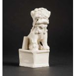 GUARDIAN LION (FO-LION) ON PEDESTAL Blanc de Chine porcelain. China, Qing dynasty (1644 -1911)