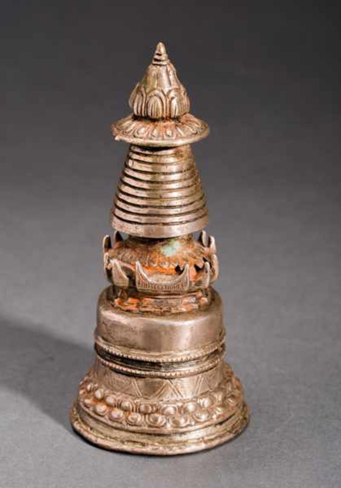 VOTIVE STUPA Silver-plated bronze. Tibet, 19th cent.On the whole, this handy chaitya has a conical - Image 3 of 4