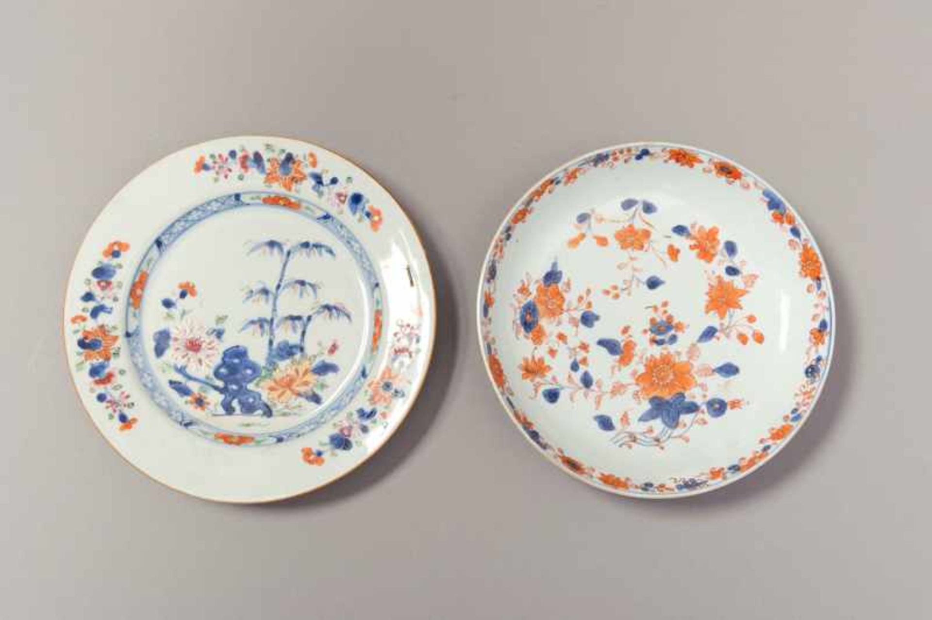 TWO COLORFULLY PAINTED PLATES Porcelain with blue underglaze, iron red and enamel paint. China,