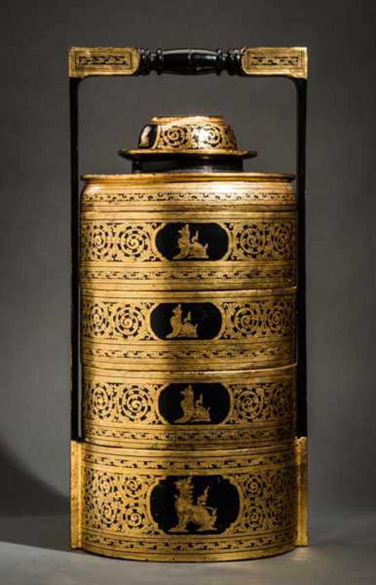 TALL MULTILAYER VESSEL Wood, bamboo, lacquer technique, gold. Burma, late Konbaung, 19th cent.Four