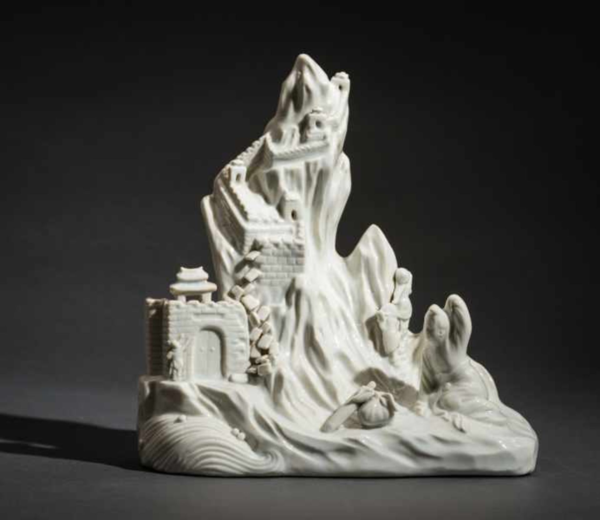 TALL CRAG WITH FORTRESS Blanc de Chine-porcelain. China, Qing (1644-1911)A very unusual Blanc de