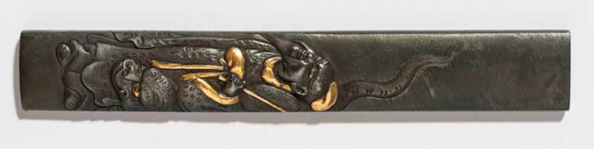 HAMANO NORIYjuki: INLAID KOZUKA WITH TAOIST MAGICIAN AND TIGER Shakudo and gold. Japan, first half