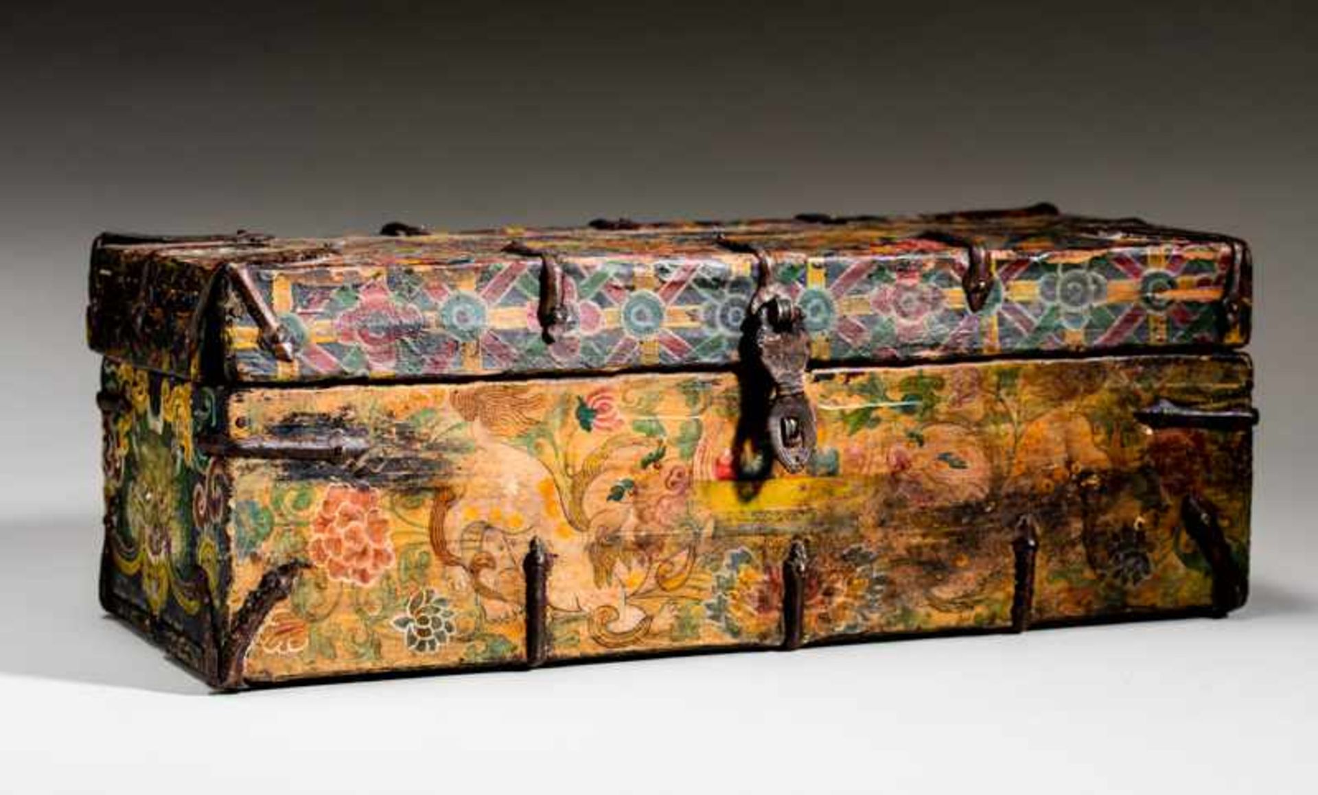 STRONGBOX WITH SNOW LIONS, TIGERS AND BOYS Colorfully painted wood, iron fittings. Tibet, 19th