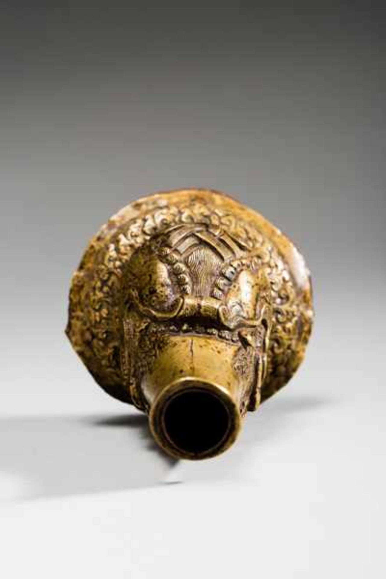 HEAD OF A MYTHICAL CREATURE Yellow bronze. Tibet, ca. 18th to 19th cent.This interesting piece is - Image 3 of 7