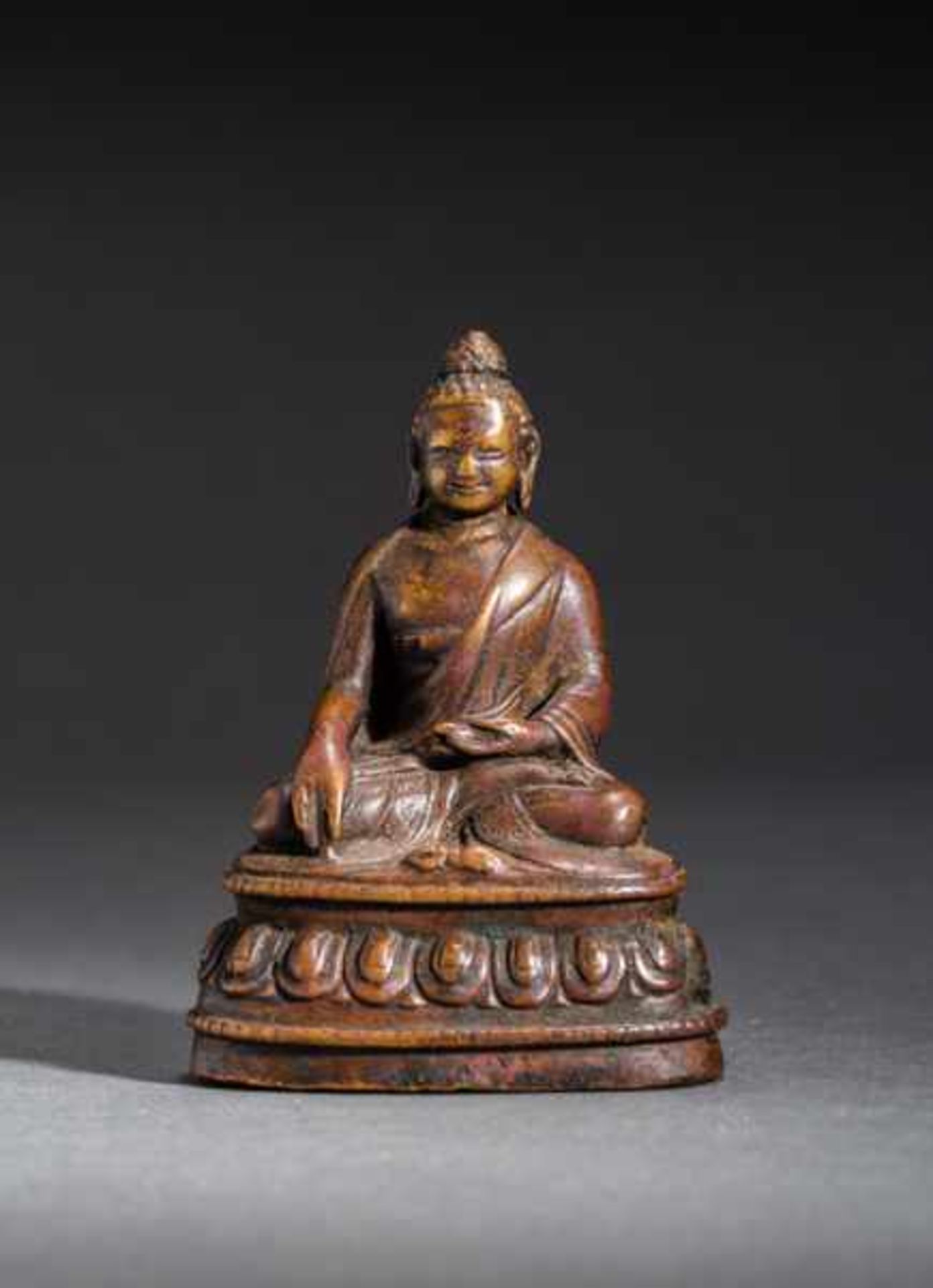 THE BUDDHA SHAKYAMUNI Bronze. Tibet, probably 12th to 13th cent.The historical Buddha Gautama