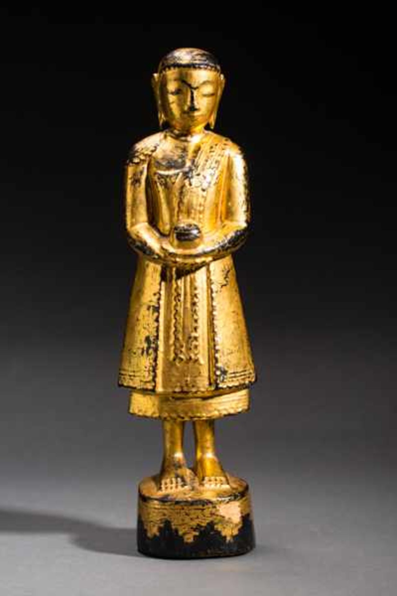 STANDING ARHAT Noble wood, lacquer, gilding. Burma, first half of 20th cent.An apostle of the