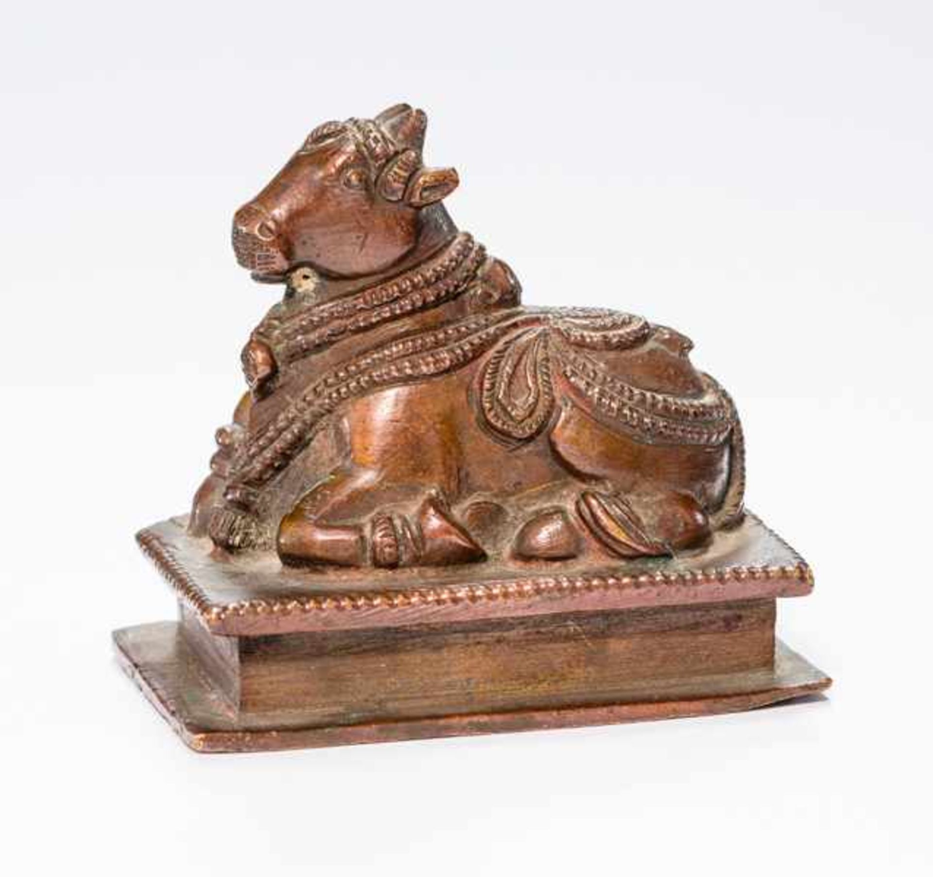 RECLINING NANDI Bronze. Southern India, 17th cent. Nandi (name means “the happy one”) the white