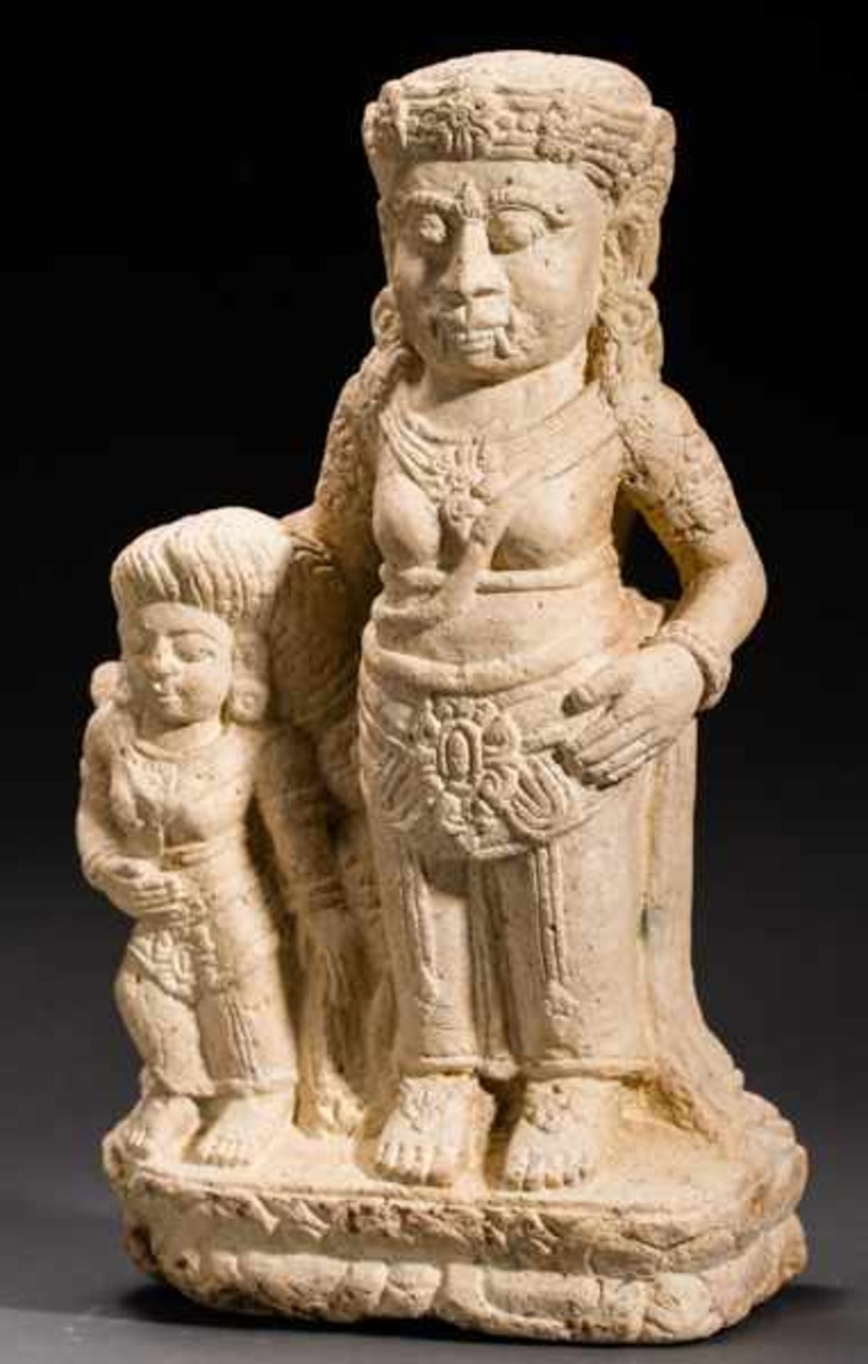 DEMON WITH FEMALE COMPANION Tuff. Majapahit, 14th to 15th cent.This very rare stele also features - Image 2 of 3