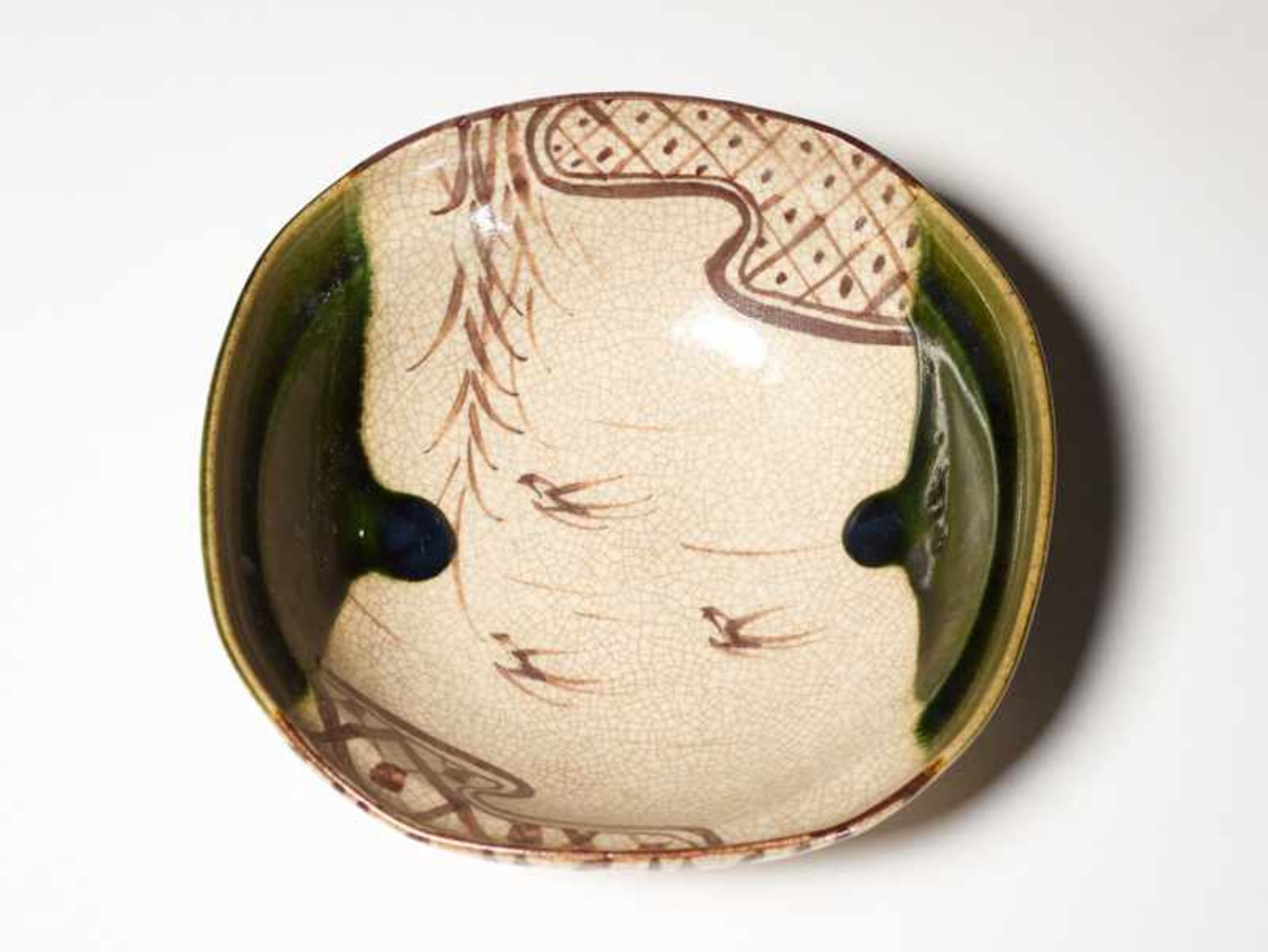 BOWL Glazed Oribe ceramic. Japan, Meiji to ShowaRound form, toward the rim lightly edged like a
