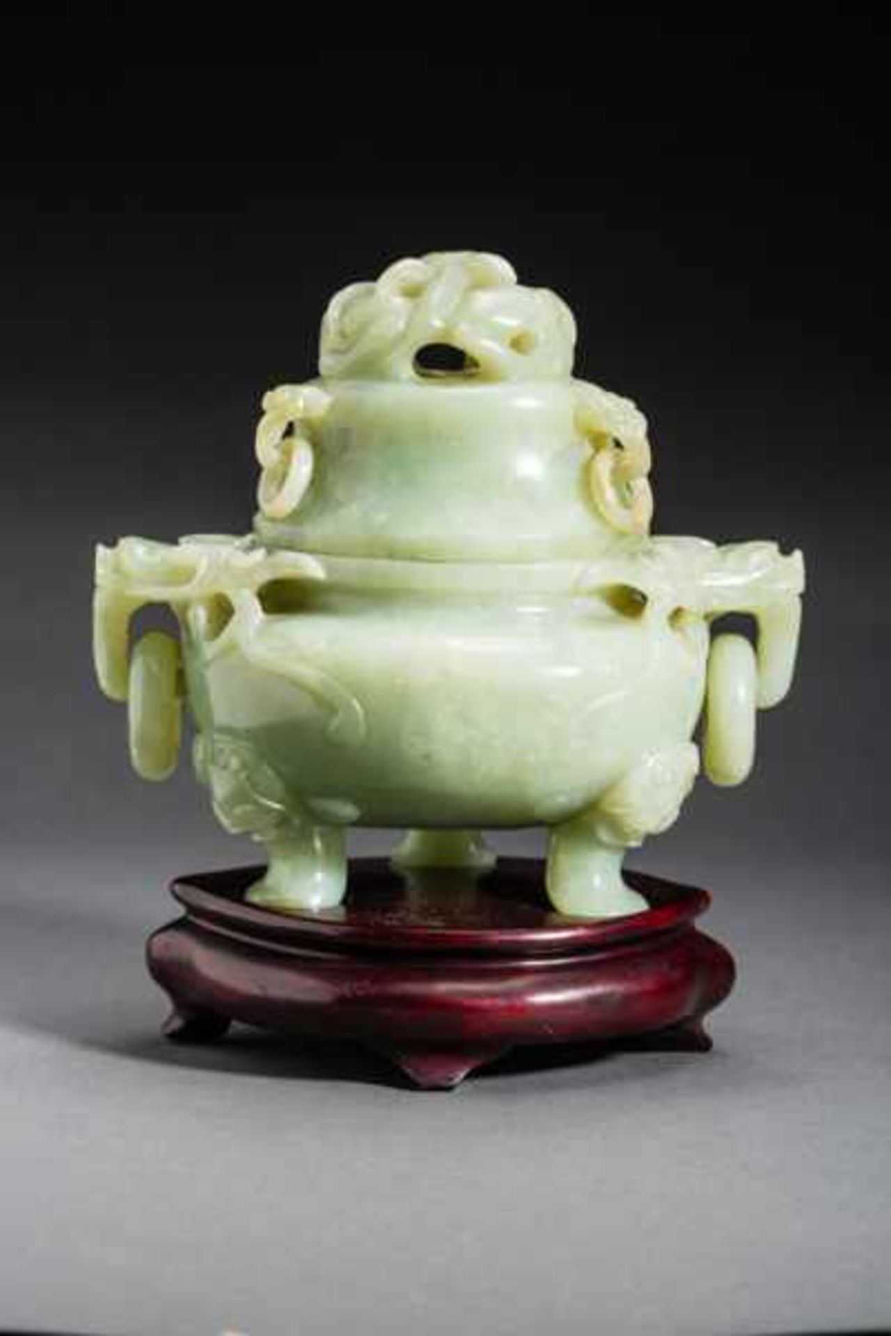 HEAVY JADE VESSEL WITH FANTASTIC ANIMALS Jade. China, Three-legged ding with lid cut out of a