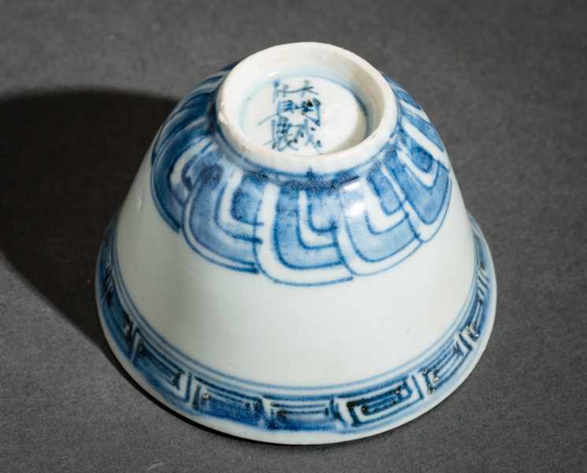 CUP Porcelain. China, Ming-dynasty, transitional 17th cent.This cup was part of a load carried by - Image 3 of 4