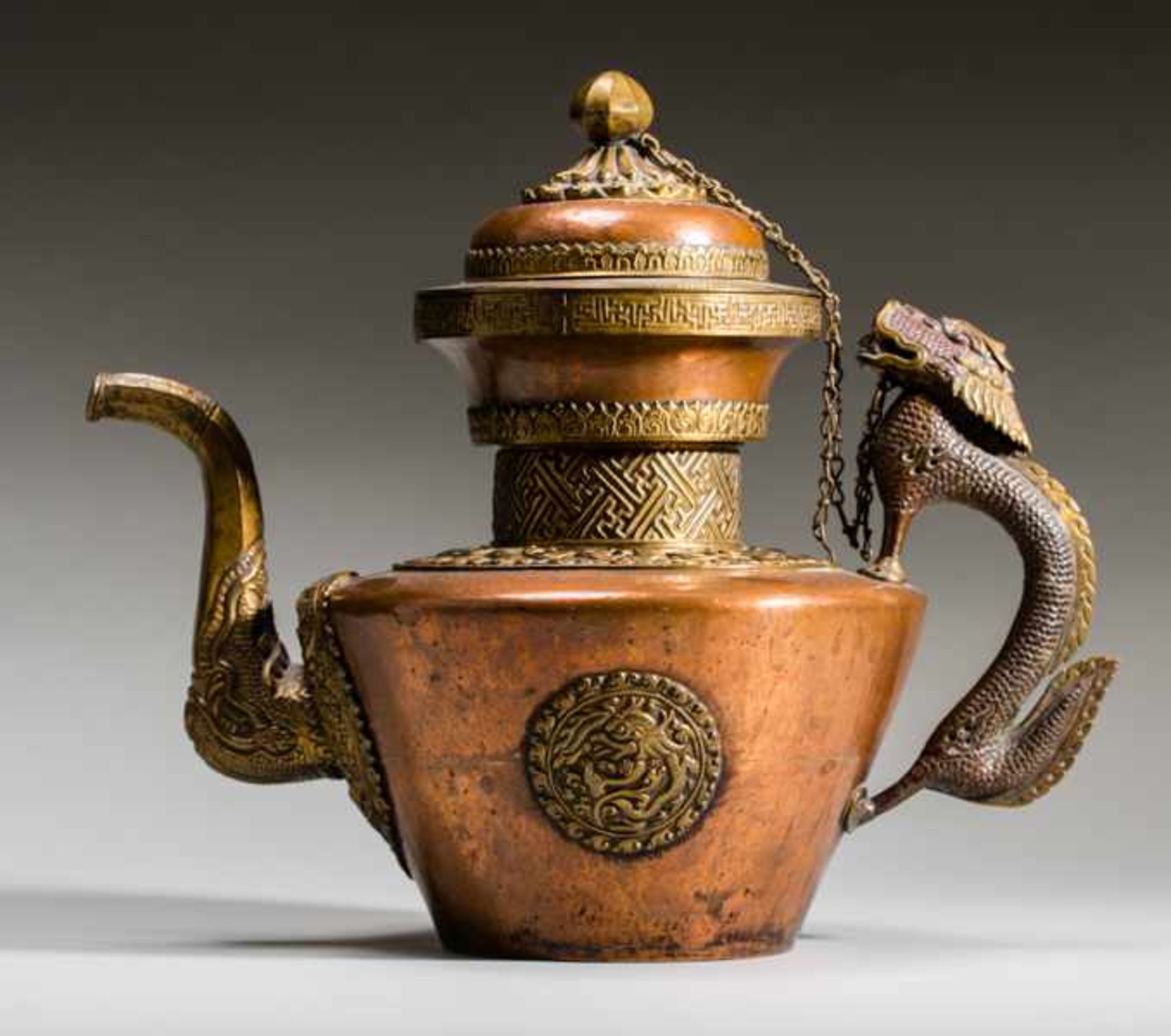 REPRESENTATIVE TEAPOT Copper and brass. Ladakh, 19th cent. to about 1900All parts of this striking