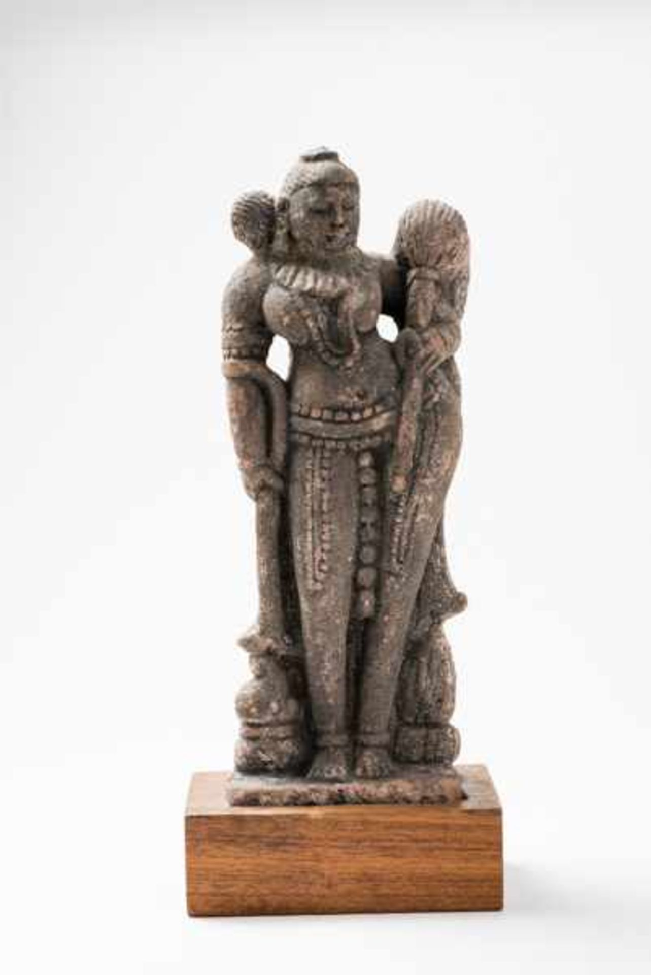 TEMPLE SCULPTURE OF A DIVINE, FEMALE MUSICIAN Sandstone. Madhya Pradesh, Northern India, probably