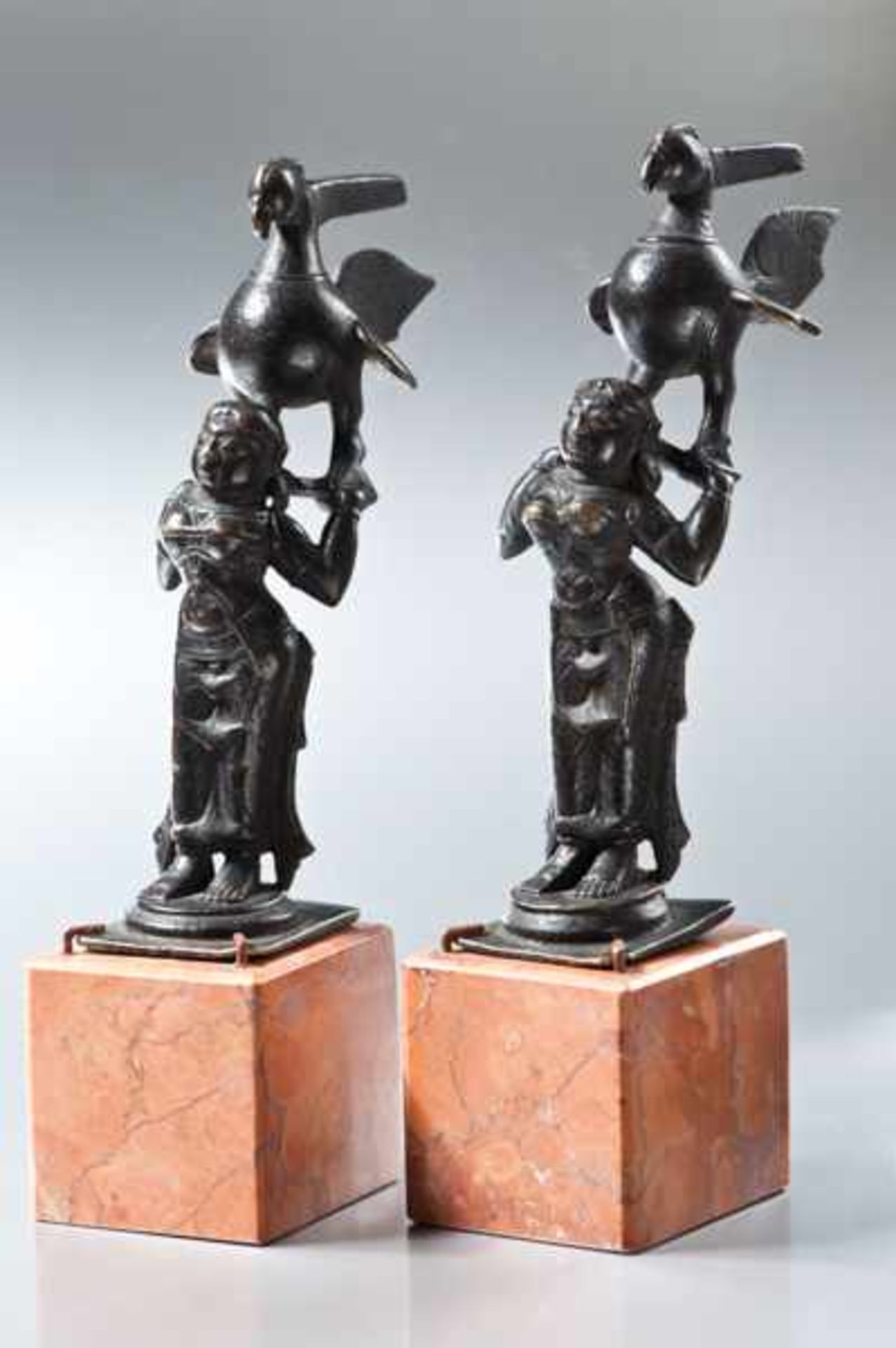 TWO SMALL, INDIAN BRONZES Bronze. Southern India, 19th cent.An unusual depiction of two young,