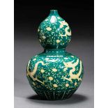 DOUBLE-GOURD-SHAPED VASE Glazed stoneware. China, The main motifs of this vase are dragons, along