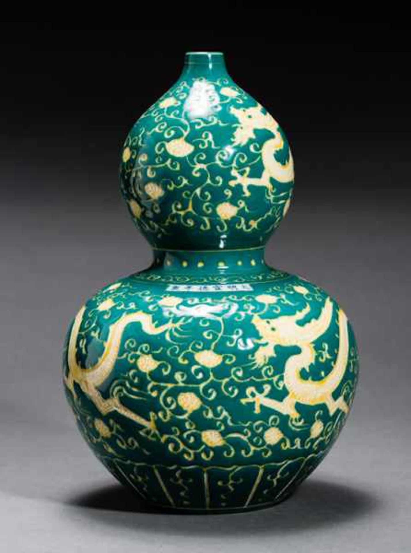 DOUBLE-GOURD-SHAPED VASE Glazed stoneware. China, The main motifs of this vase are dragons, along