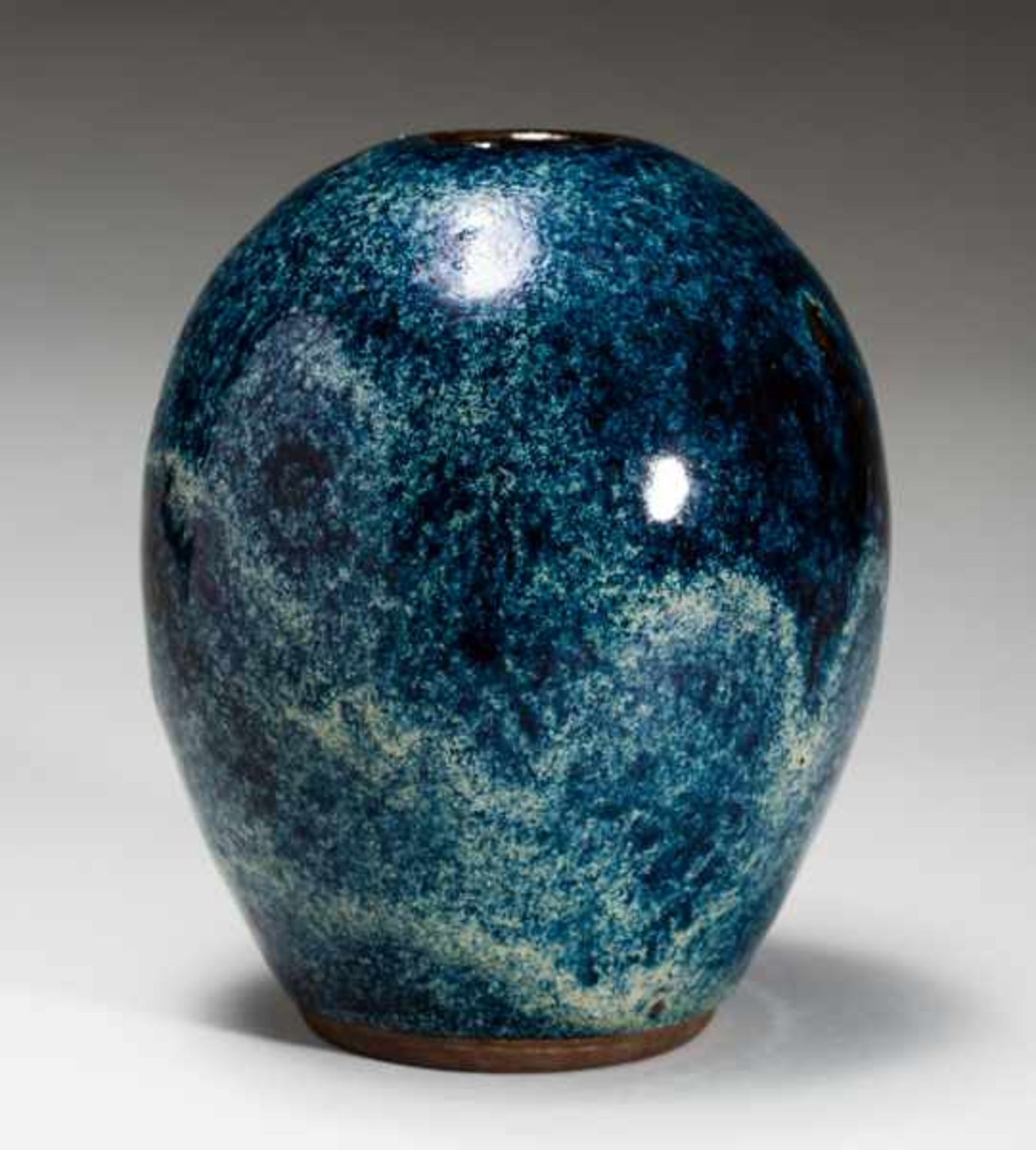 OVAL VASE WITH SPECKLED GLAZE Glazed ceramic. China, The oval vase has no neck and the opening is