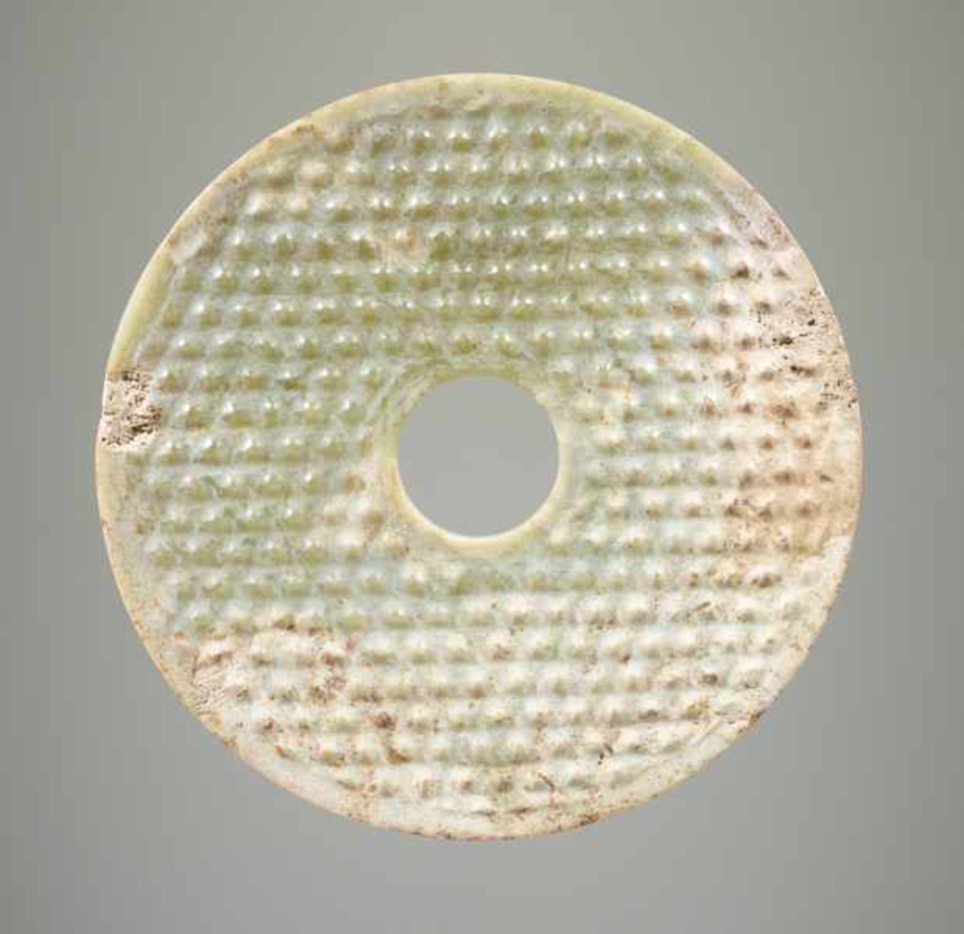 DISC BI Jade. China, Han dynasty, 206 BC - 220 CEMedium-sized bi-disc with prominent, strictly