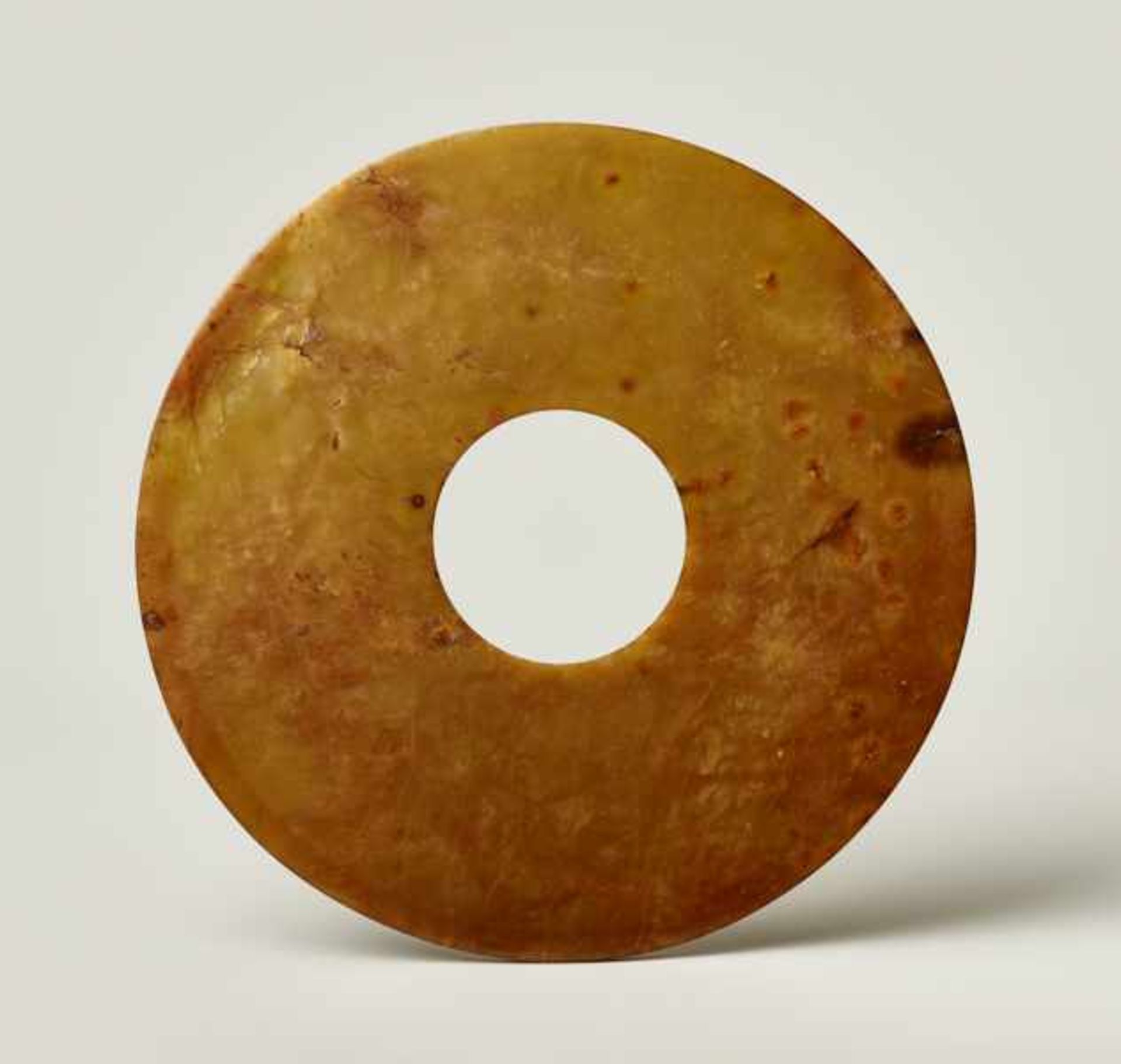 LARGE BI-DISC Jade. China, early Bronze Age, c. 2000 - 1900 BCThis bi displays excellent