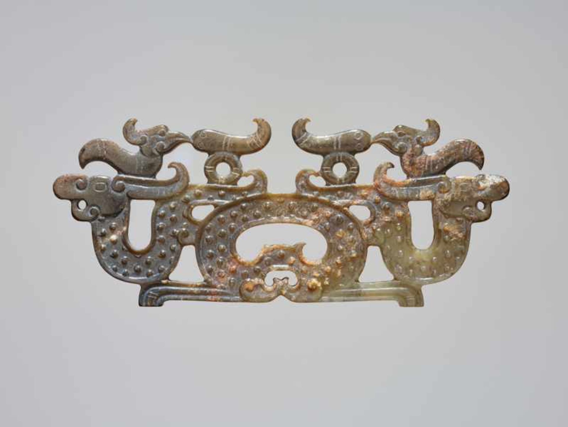 DECORATIVE PENDANT WITH DRAGONS Jade. China, Chu culture, Eastern Zhou, 5th - 4th century BCA very