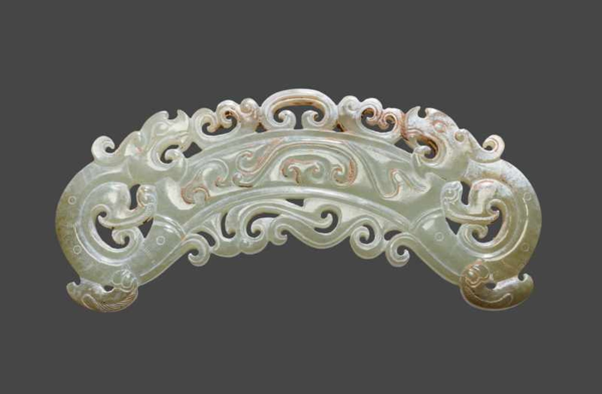 DECORATIVE PENDANT HUANG WITH DRAGONS Jade. China, Eastern Han, 25 - 220 ADThis very elaborately