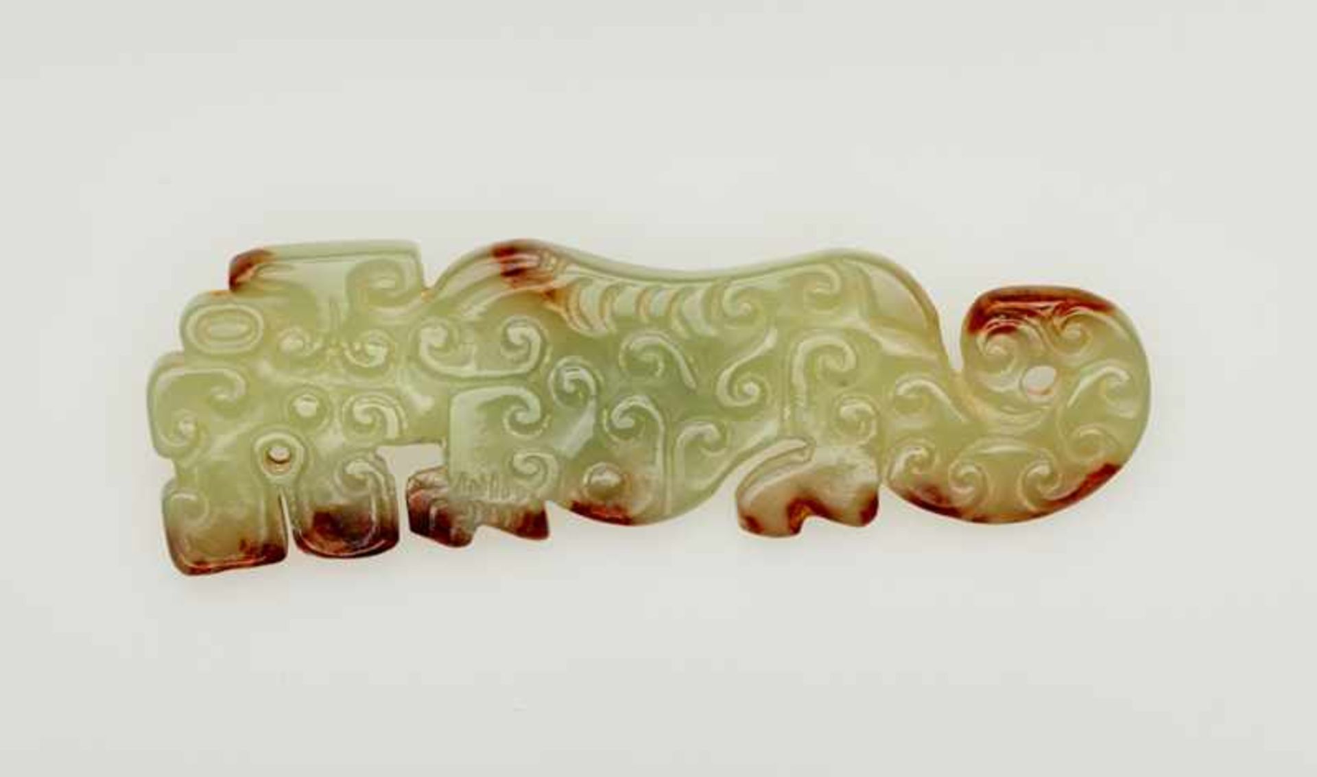 TIGER HU Jade. China, Eastern Zhou, 6th - 5th century BC This large, husky head is suggestive of a