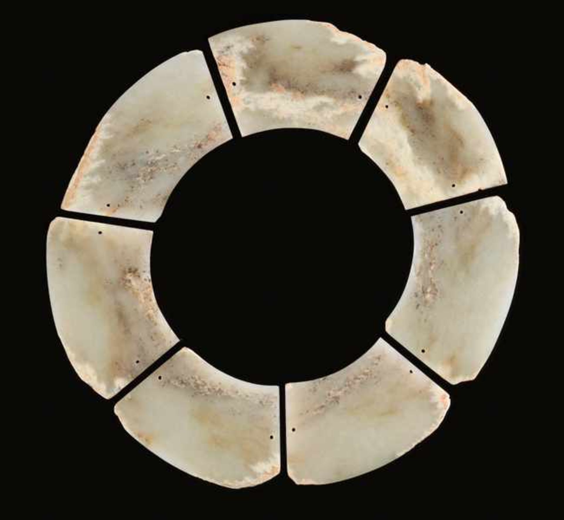 HUAN CONSISTING OF SEVEN PARTS Jade. China, late Neolithic to early Bronze Age, ca. 2200 - 1500