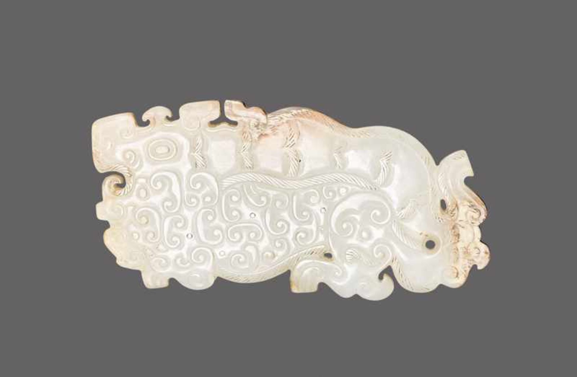 TIGER HU Jade. China, Eastern Zhou, 5th-4th century BCThis particularly attractive, white Khotan-