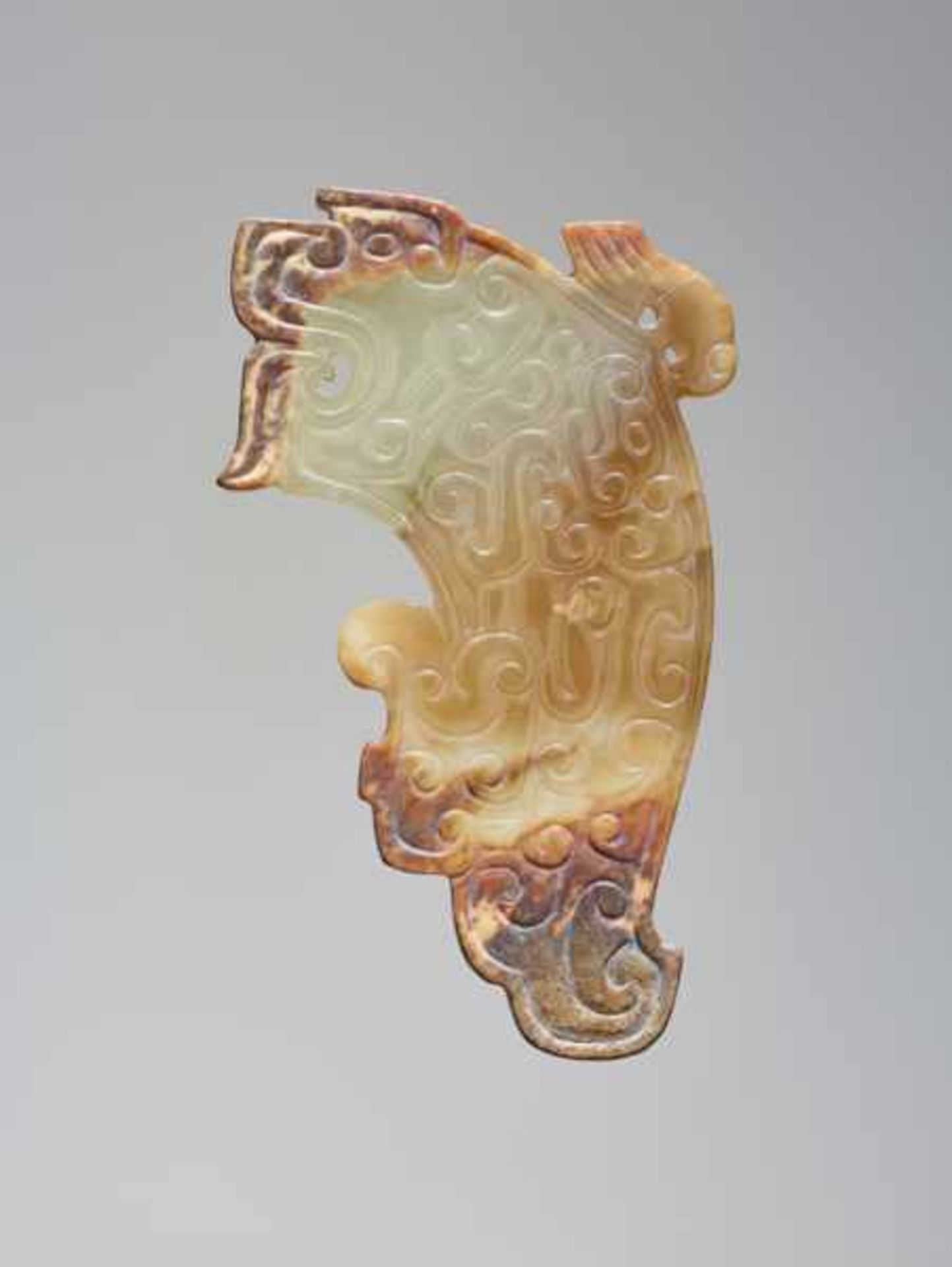 ARCHAIC KUI-DRAGON Jade. China, Eastern Zhou, 6th - 5th century BCThis powerful, short, arching