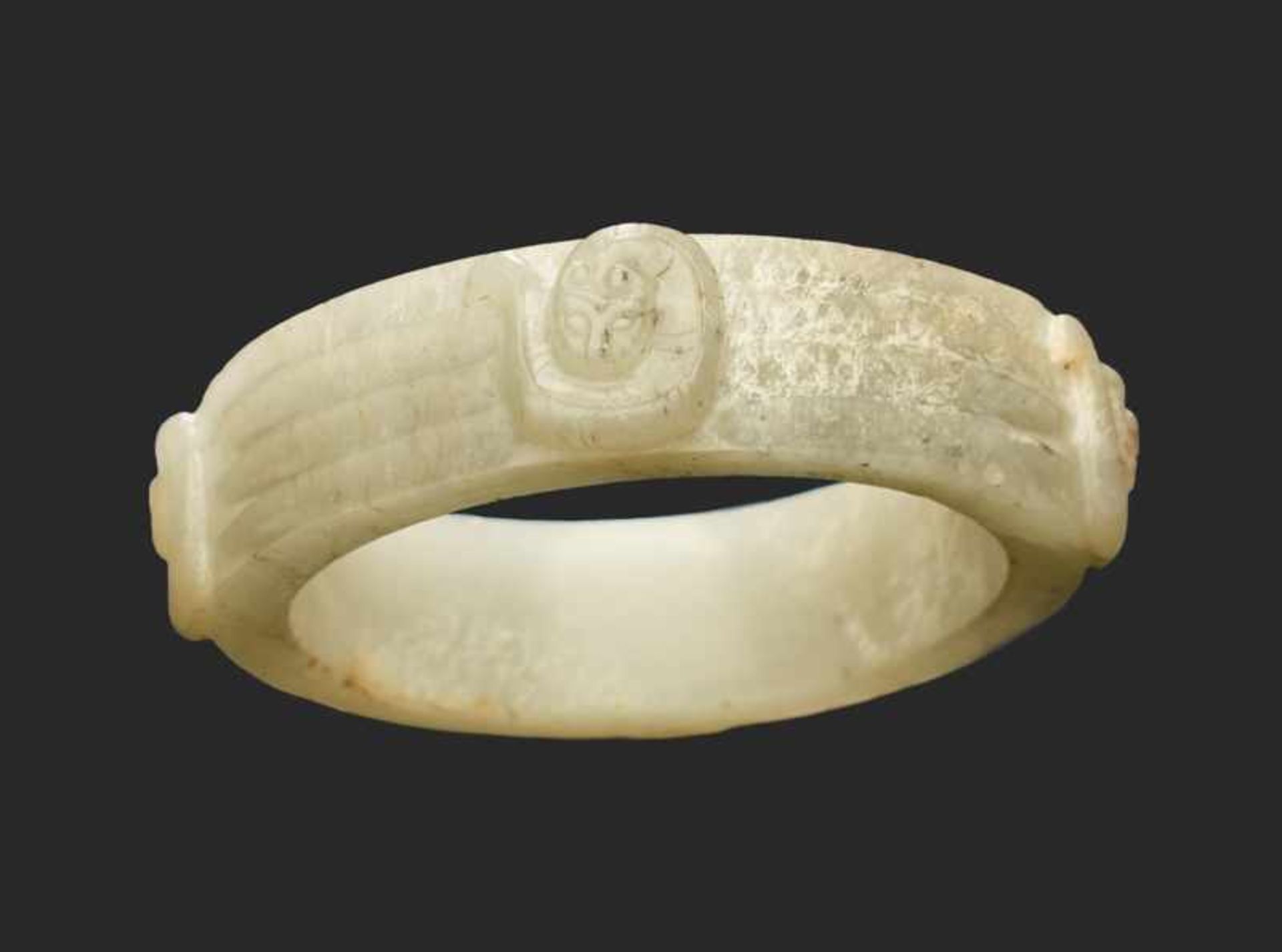 BRACELET ZHOU WITH FOUR DRAGONS Jade. China, late Eastern Zhou, 4th-3rd century BCMade for a very