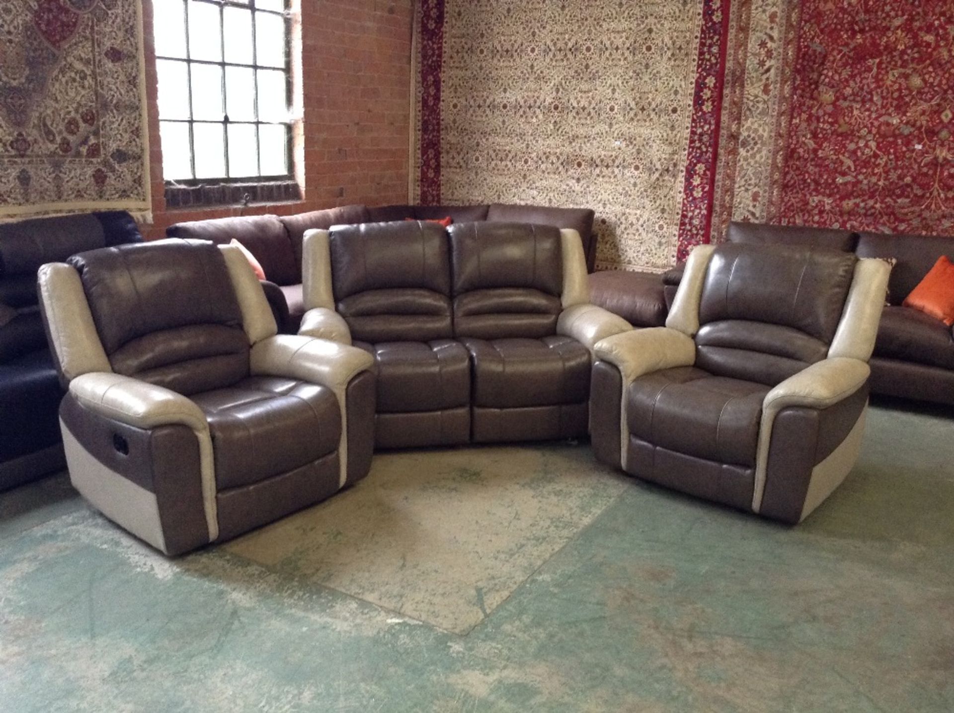 BROWN AND EGG SHELL MANUAL RECLINING 2 SEATER SOFA