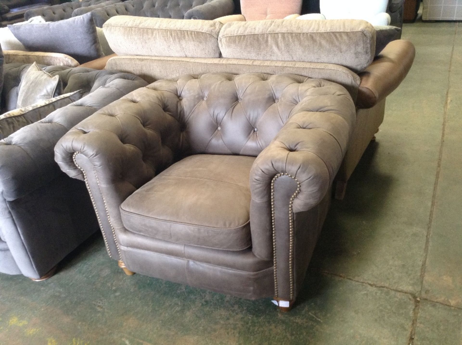 BROWN LEATHER CHESTERFIELD CHAIR