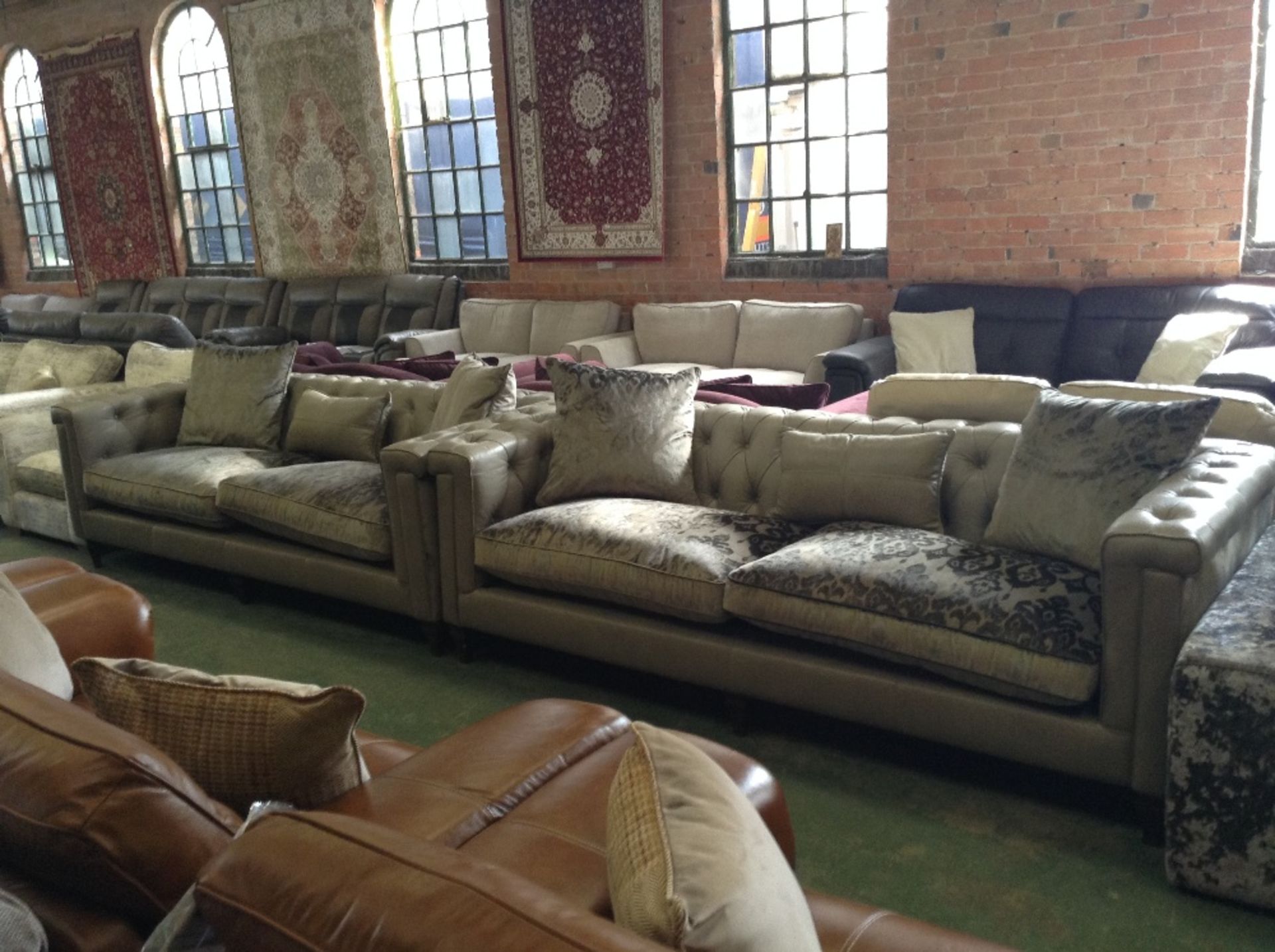 2 x CREAM HALF HIDE 3 SEATER SOFAS (1 cushion has