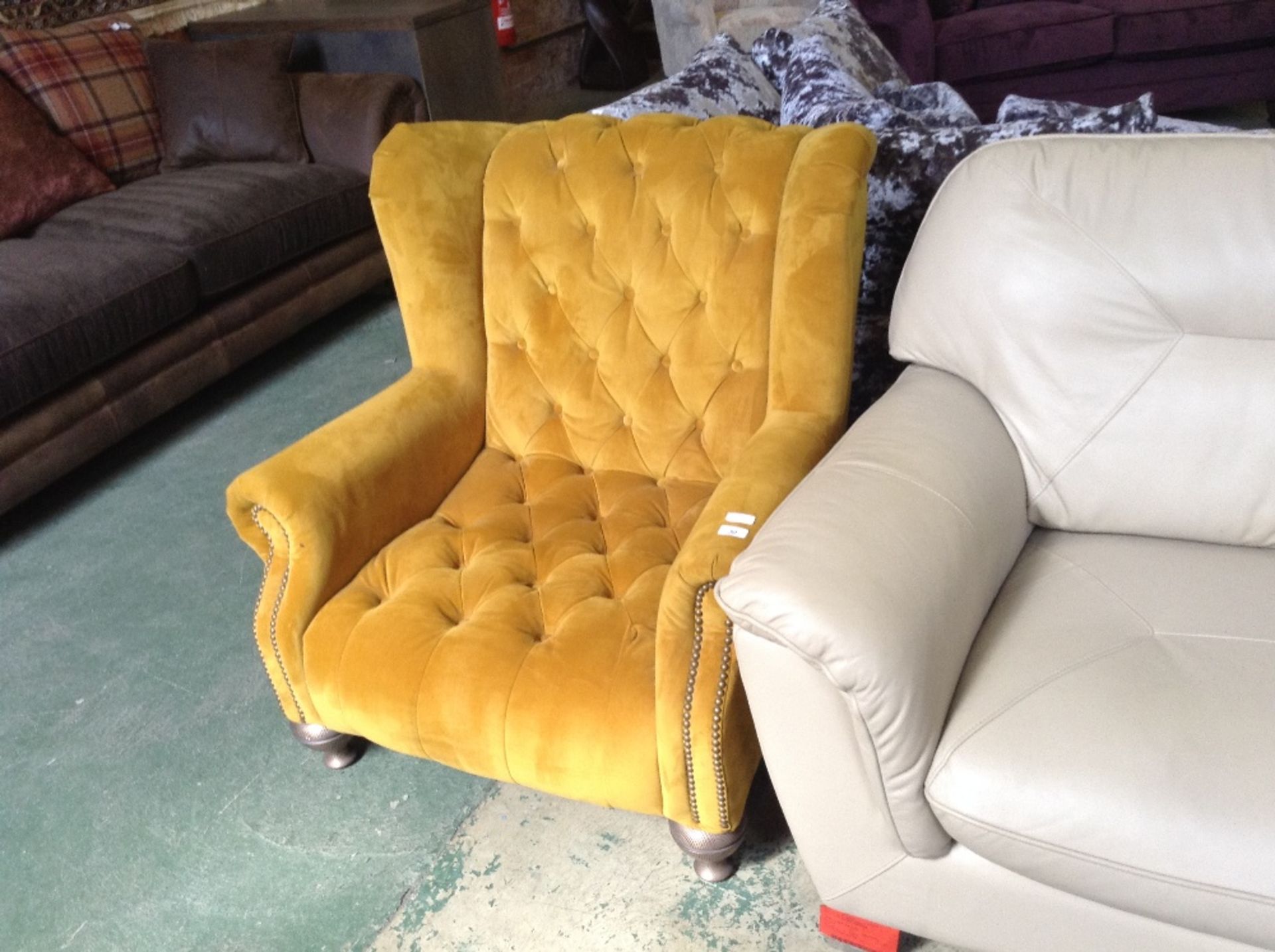 YELLOW BUTTON BACK WING CHAIR (missing one button)