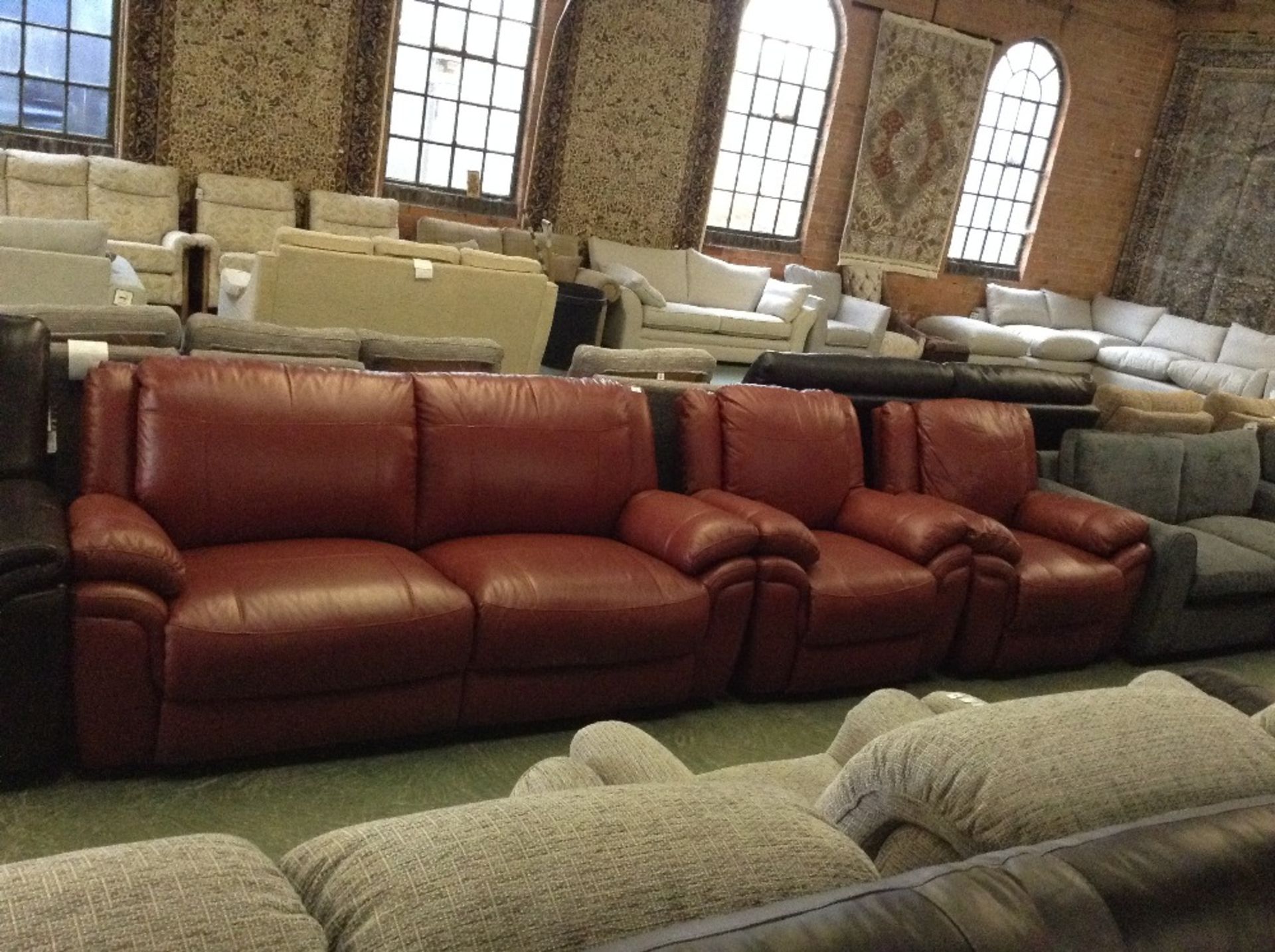 RED LEATHER 3 SEATER SOFA AND 2 MANUAL RECLINING C