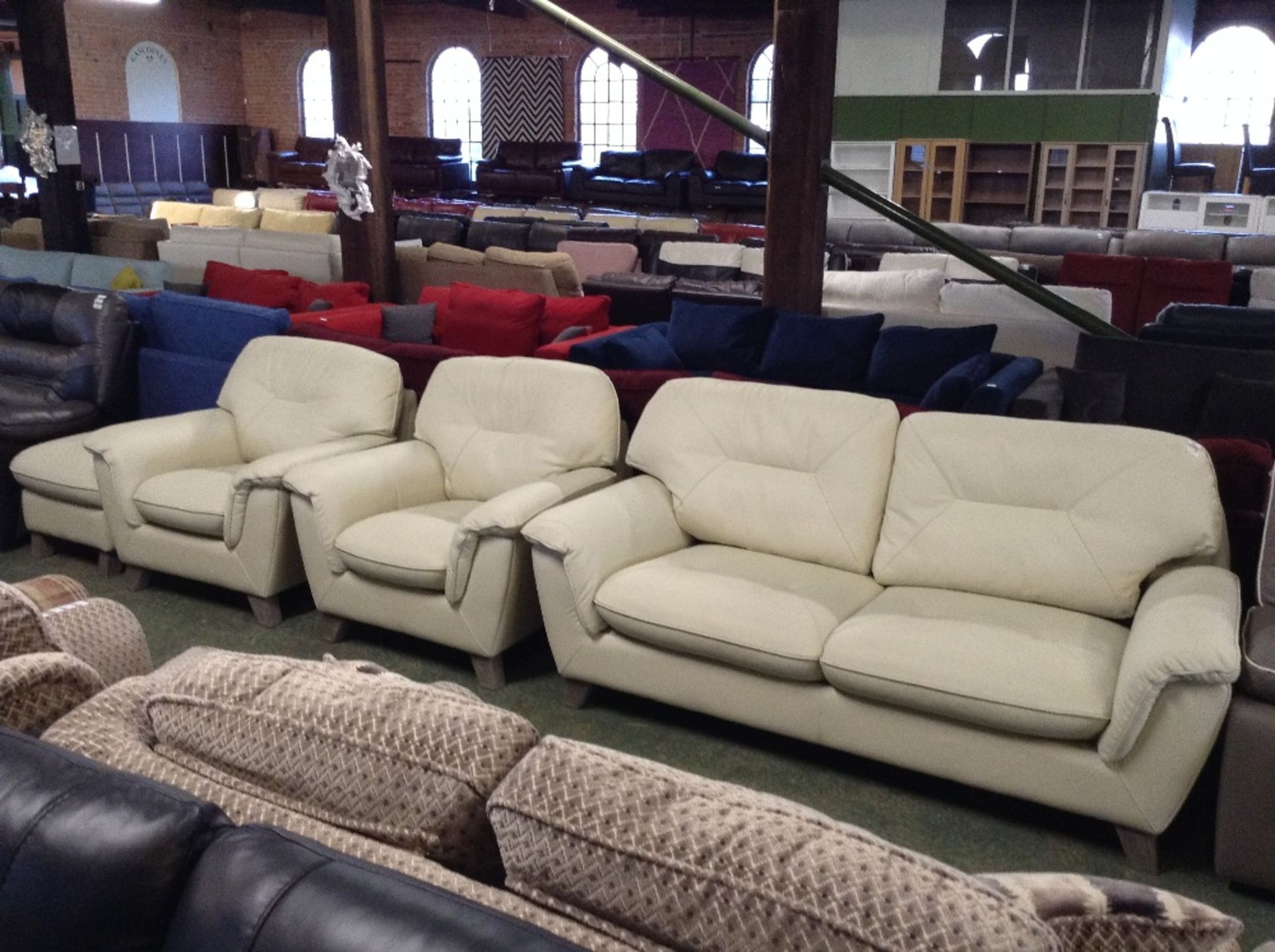 CREAM LEATHER 3 SEATER SOFA, 2 CHAIRS AND FOOTSTOO