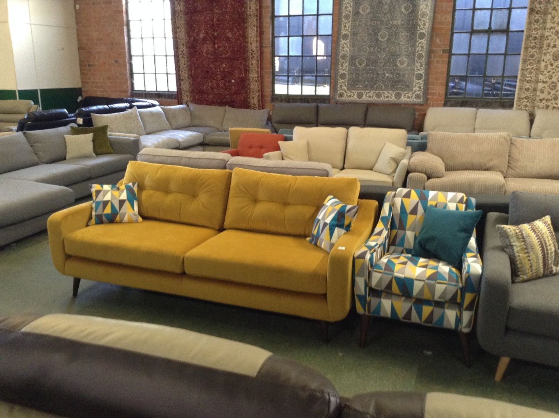 YELLOW 3 SEATER SOFA AND MULTI-COLOURED PATTERNED