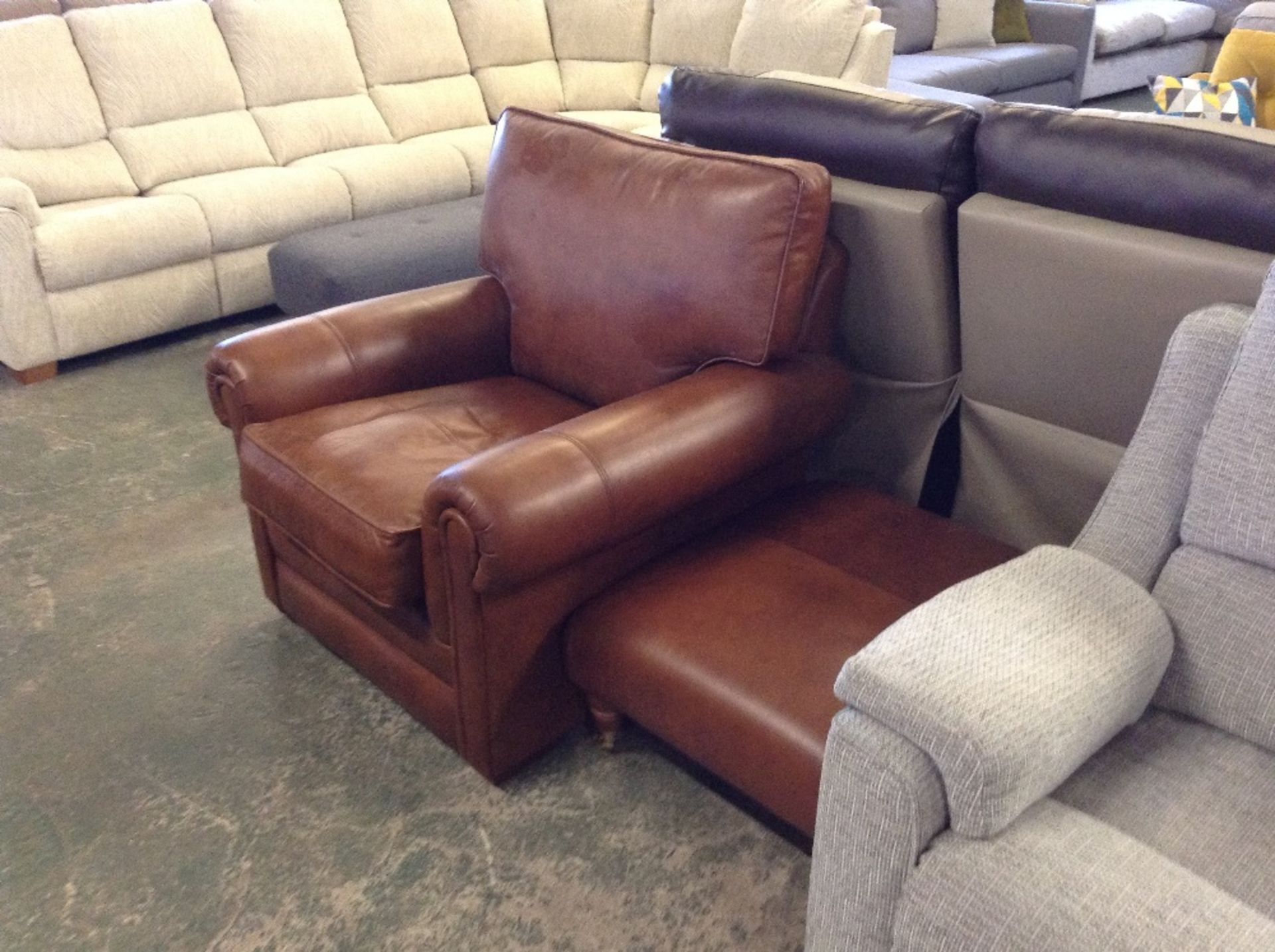 BROWN LEATHER CHAIR AND FOOTSTOOL (TR0001012 WO028
