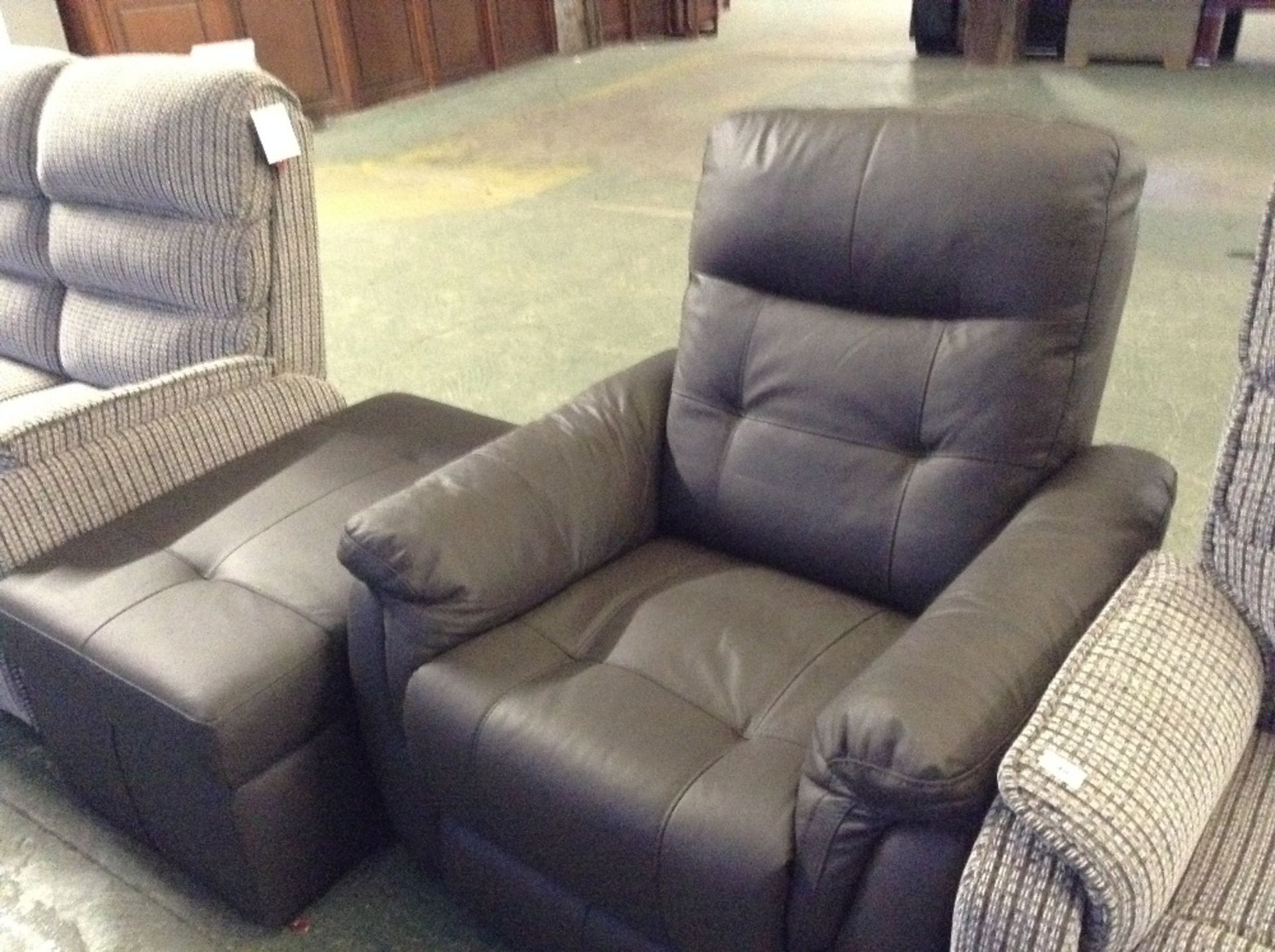 BROWN LEATHER MANUAL RECLINING CHAIR AND LARGE STO