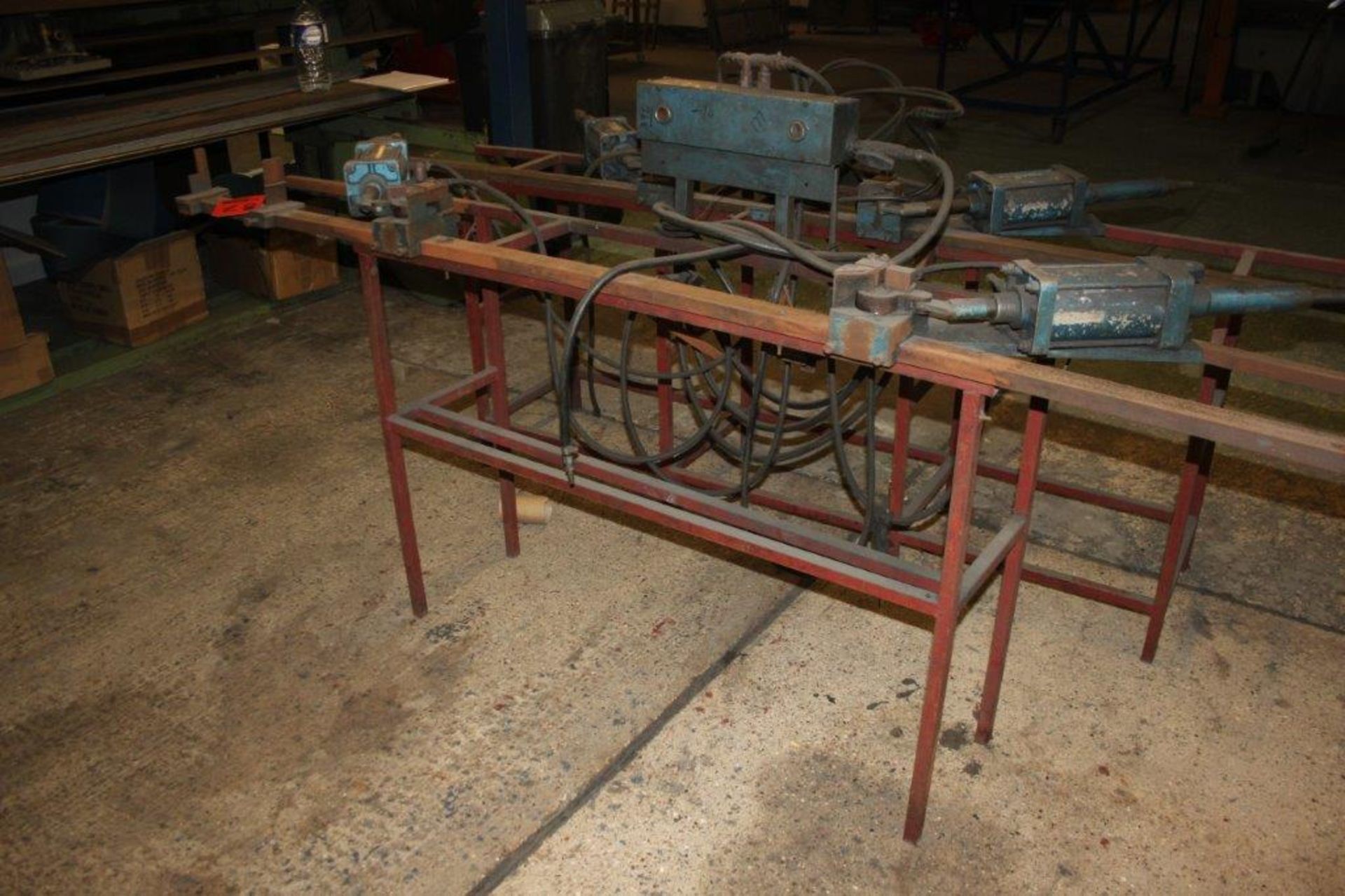 DOUBLE ENDED ADJUSTABLE PNEUMATIC WIRE BENDER AND STAND