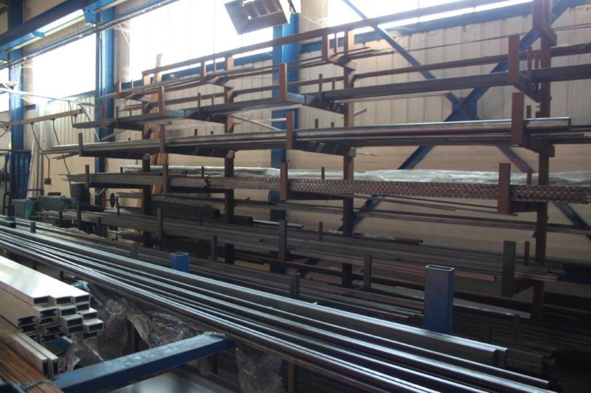 LARGE QTY OF PROFILE STEEL AND RACK (QTY MAY VARY FROM PICTURE BUT WILL BE CORRECT ON VIEWING DAY)