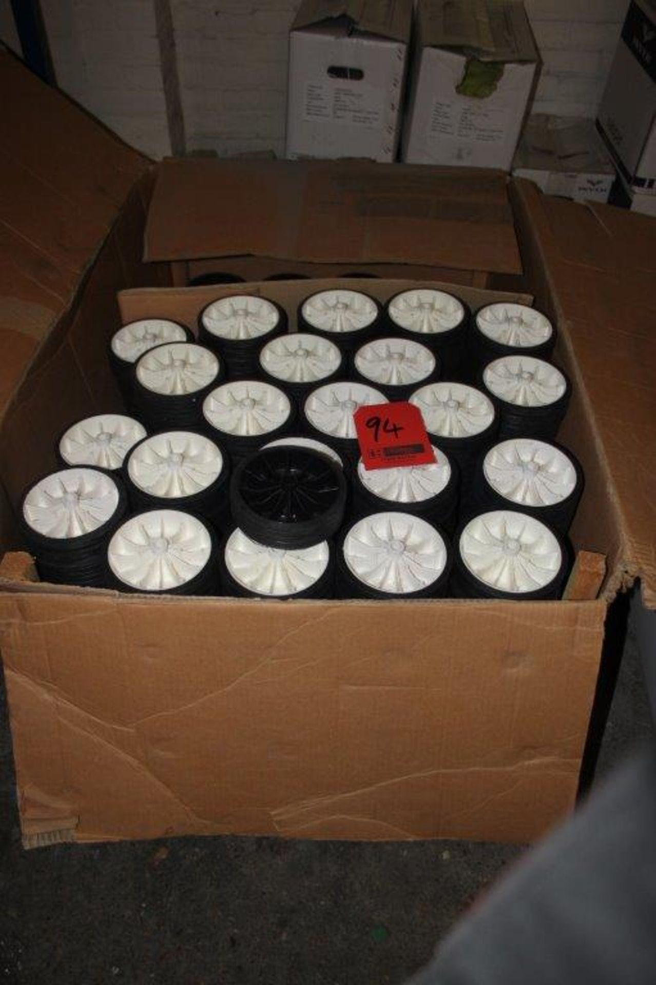 APPROX 260 WHITE AND 80 BLACK 150MM RUBBER OUTER PLASTIC WHEELS