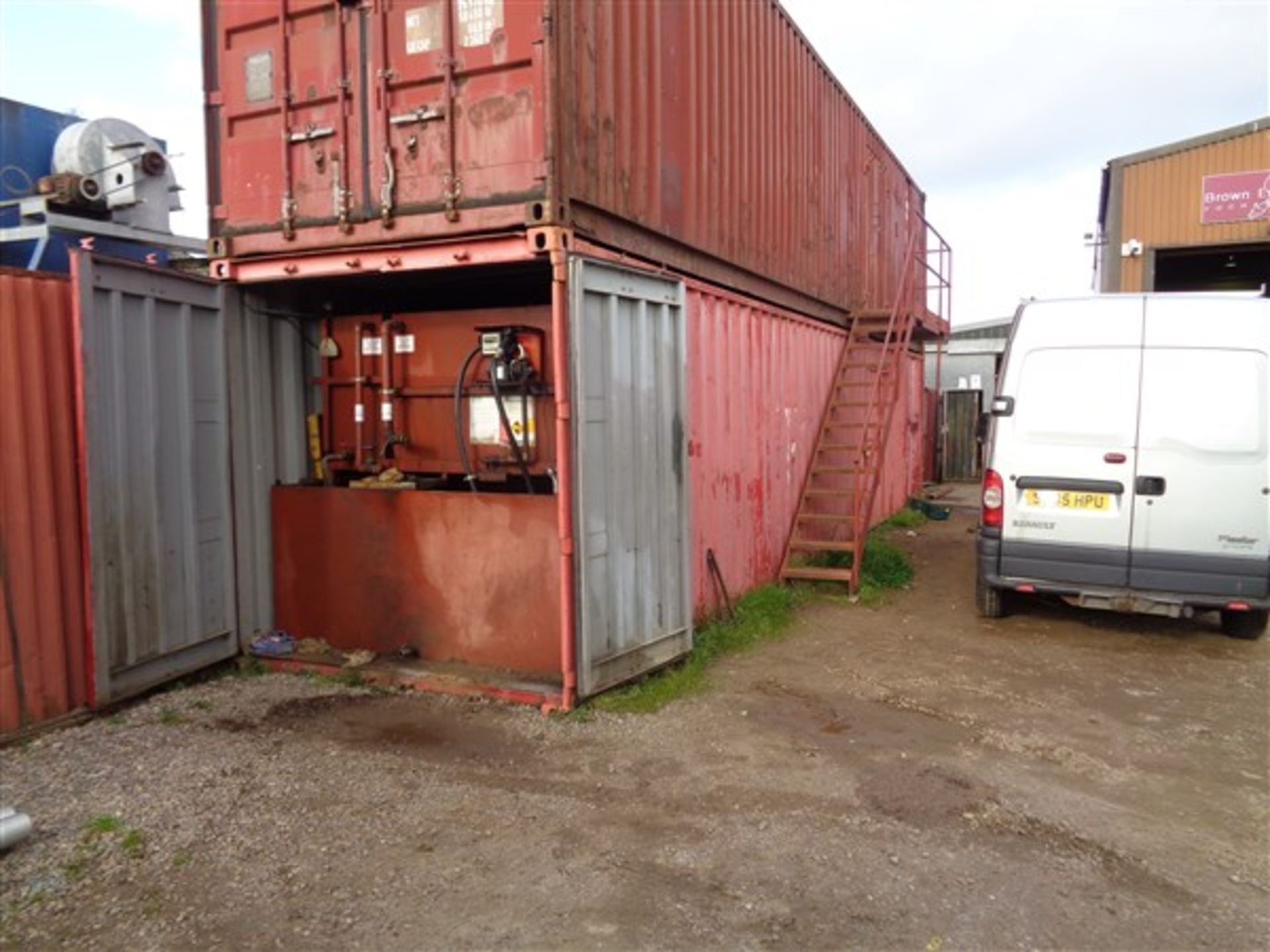 40' steel shipping container complete with bunded twin fuel tank containing approx. 2000 litres of