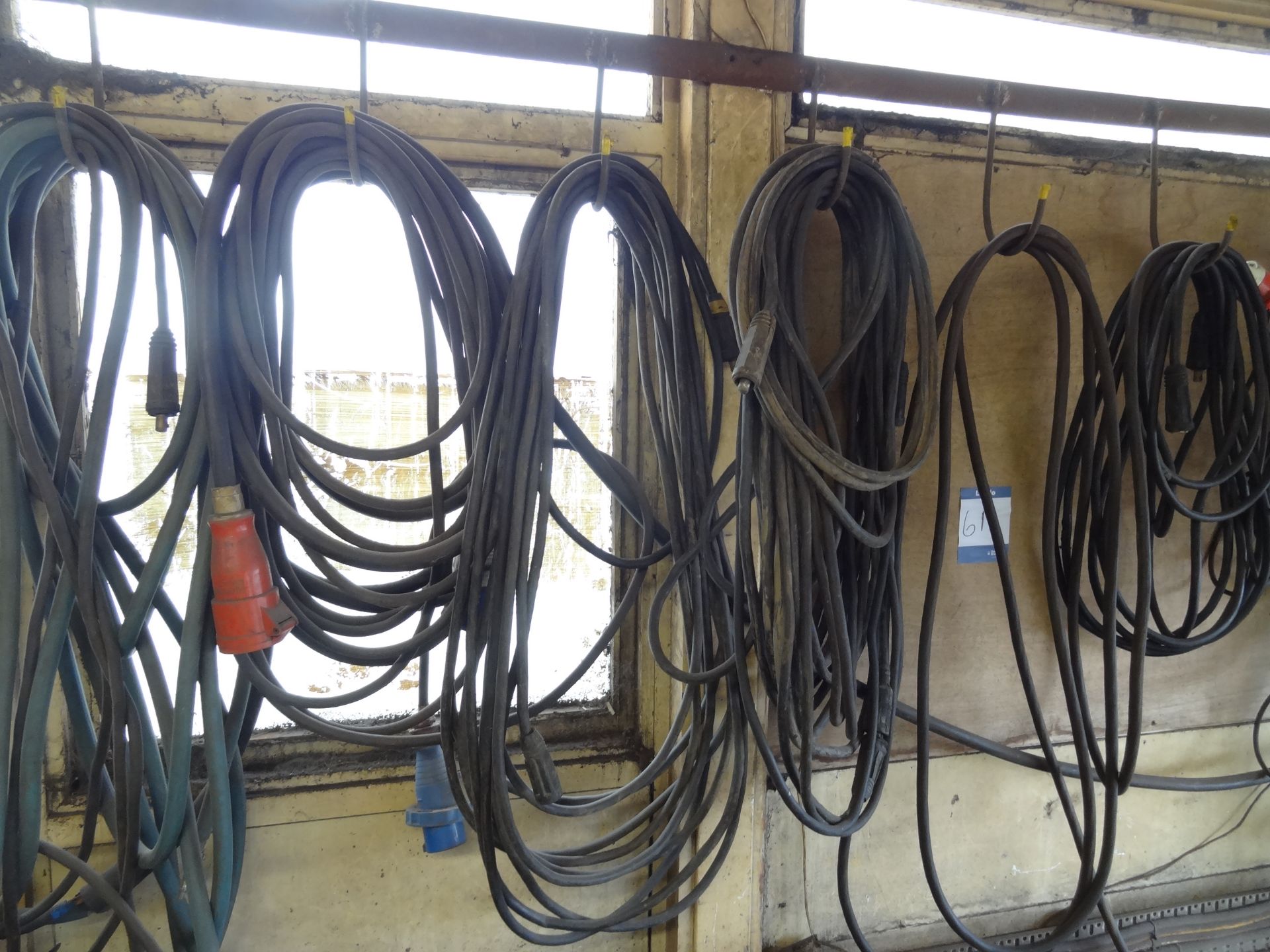 9 x sets of welding leads mounted on wall (Lift out charge £5 plus VAT)
