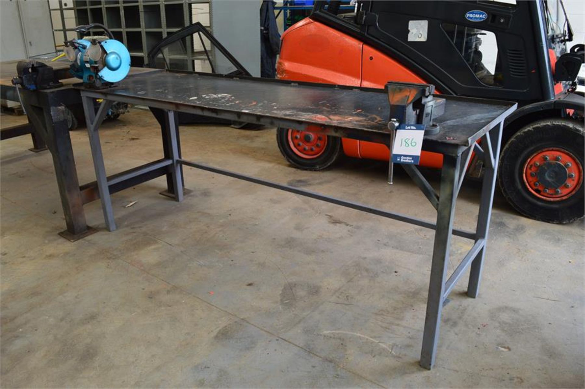 Steel workbench with Clarke 8" double ended angle grinder and 150 vice