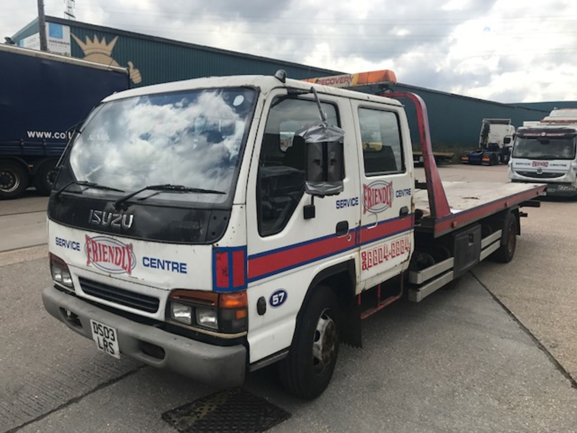 Isuzu NQR 7.5t crew cab breakdown recovery vehicle complete with flat bed body unbadged, winch and - Image 2 of 16