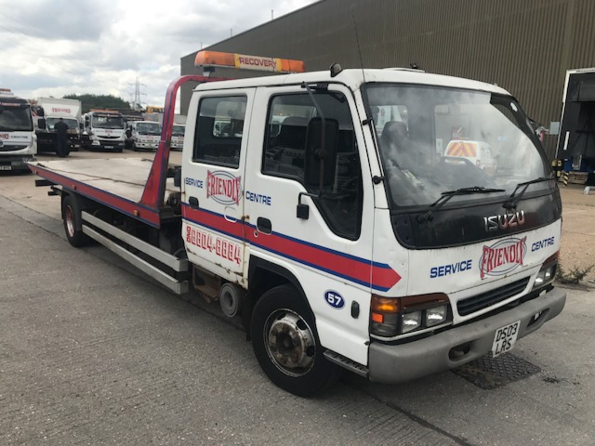 Isuzu NQR 7.5t crew cab breakdown recovery vehicle complete with flat bed body unbadged, winch and