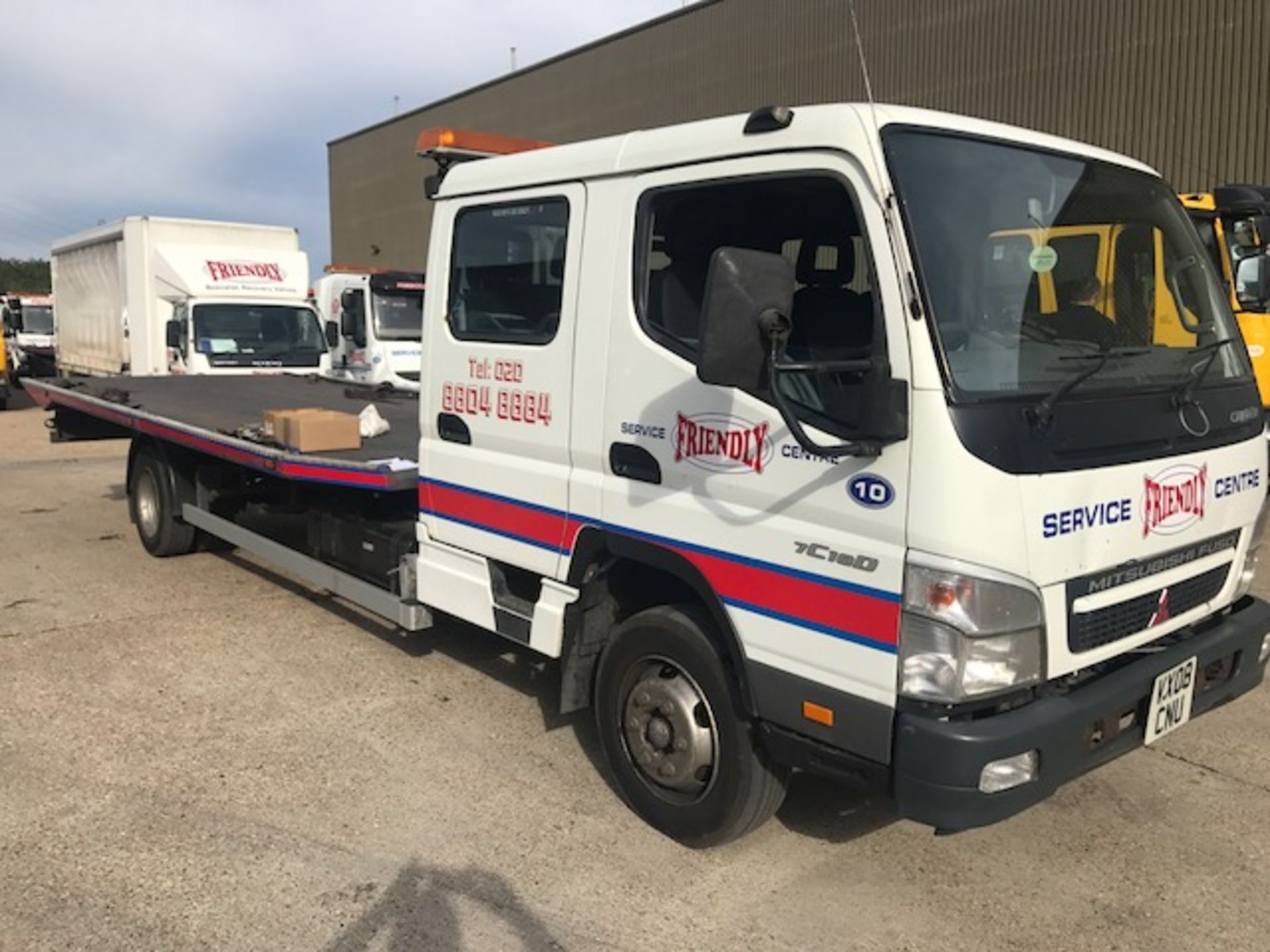 2008 Mitsubishi Fuso 7.5T crew cab tilt and Roger Dyson Group flat bed body with winch and built