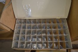 Box of approximately 50 Rolls Royce aircraft jet engine turbine blades as lotted